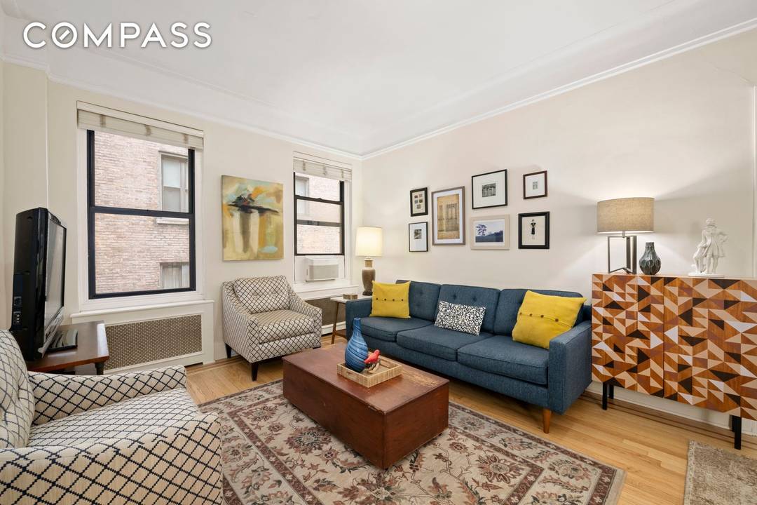 Elegant Pre War One Bedroom Just Off Central Park Nestled on a picturesque, tree lined street mere steps from Central Park, this beautifully maintained one bedroom, one bathroom co op ...