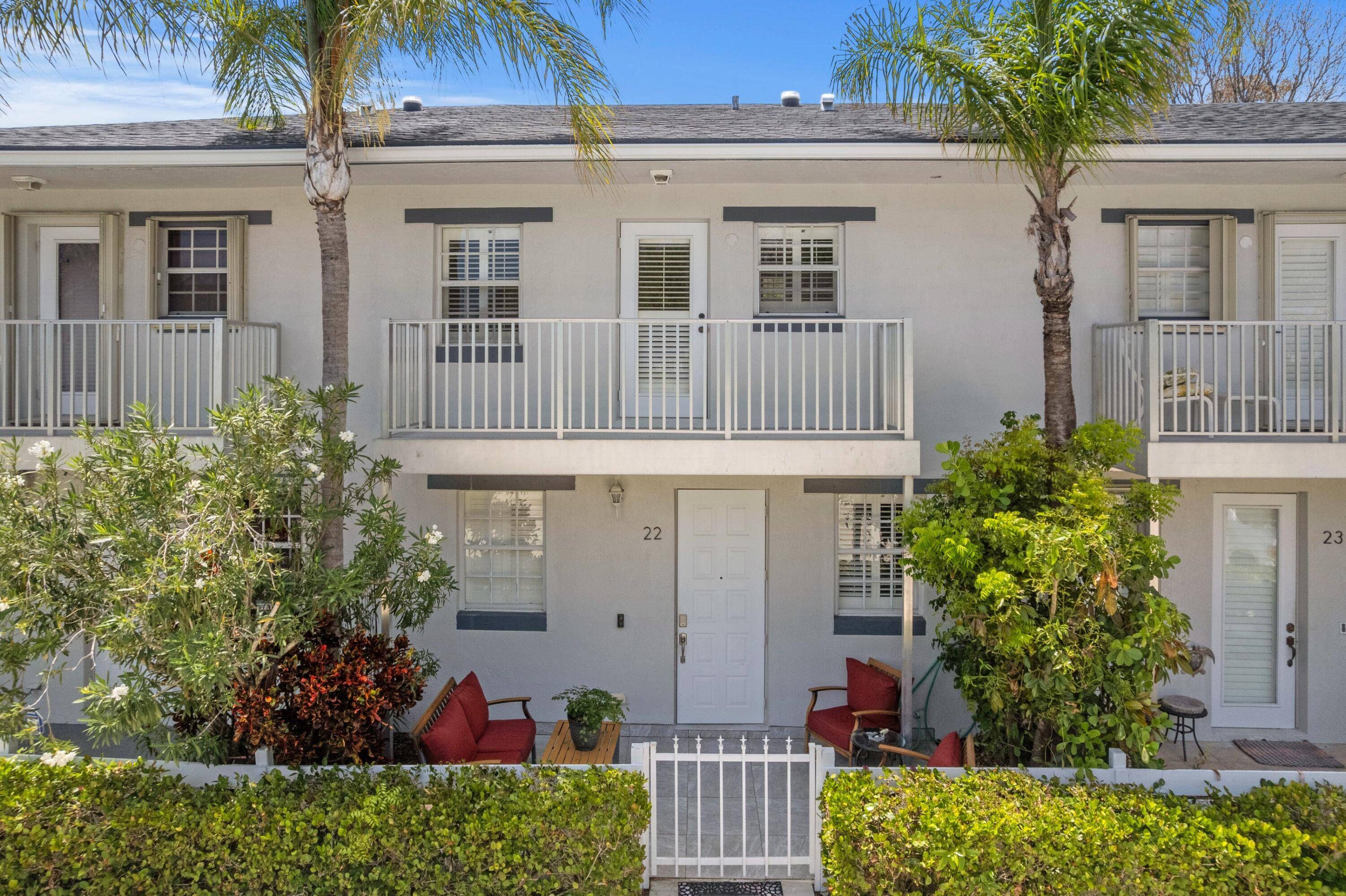 Experience the ultimate Florida lifestyle with this stunningly renovated townhouse in the sought after Mango Villas community.
