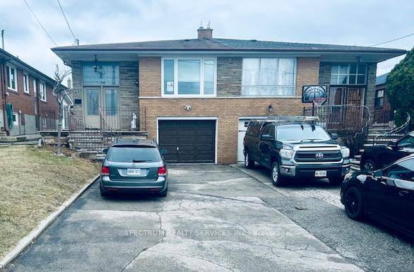 Beautifully Maintained and Well Kept Solid Brick 4 Level backsplit.