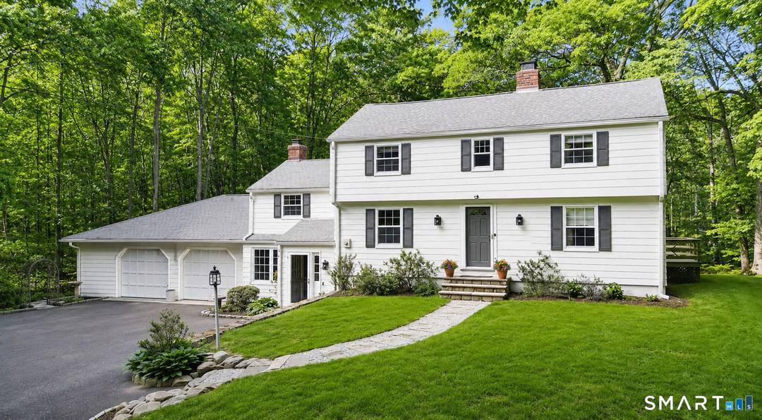 Quietly set back from the road in one of New Canaan's most serene settings, 493 Valley Road is a beautifully updated 4 bedroom, 4 bath Colonial offering an exceptional sense ...