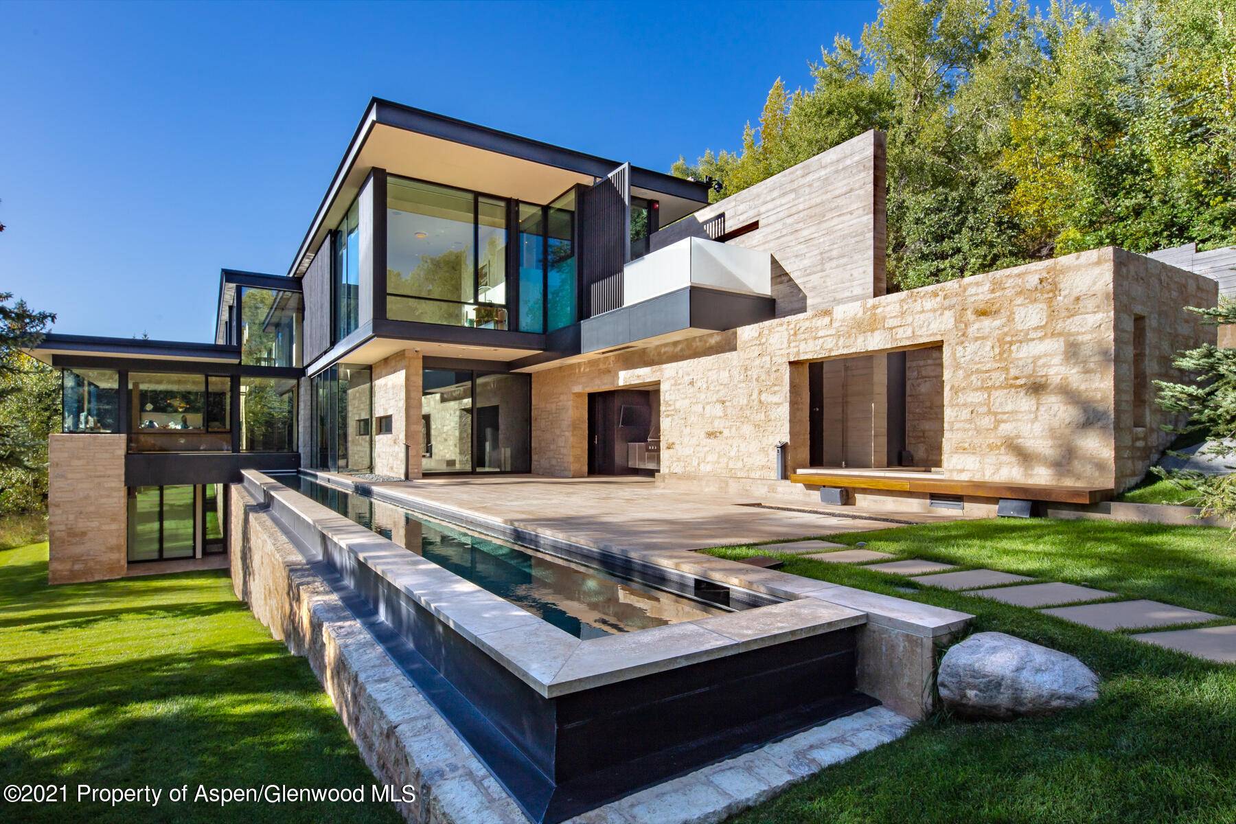 A rare Red Mountain offering on an acre lot with panoramic views of Aspen Mountain and beyond.