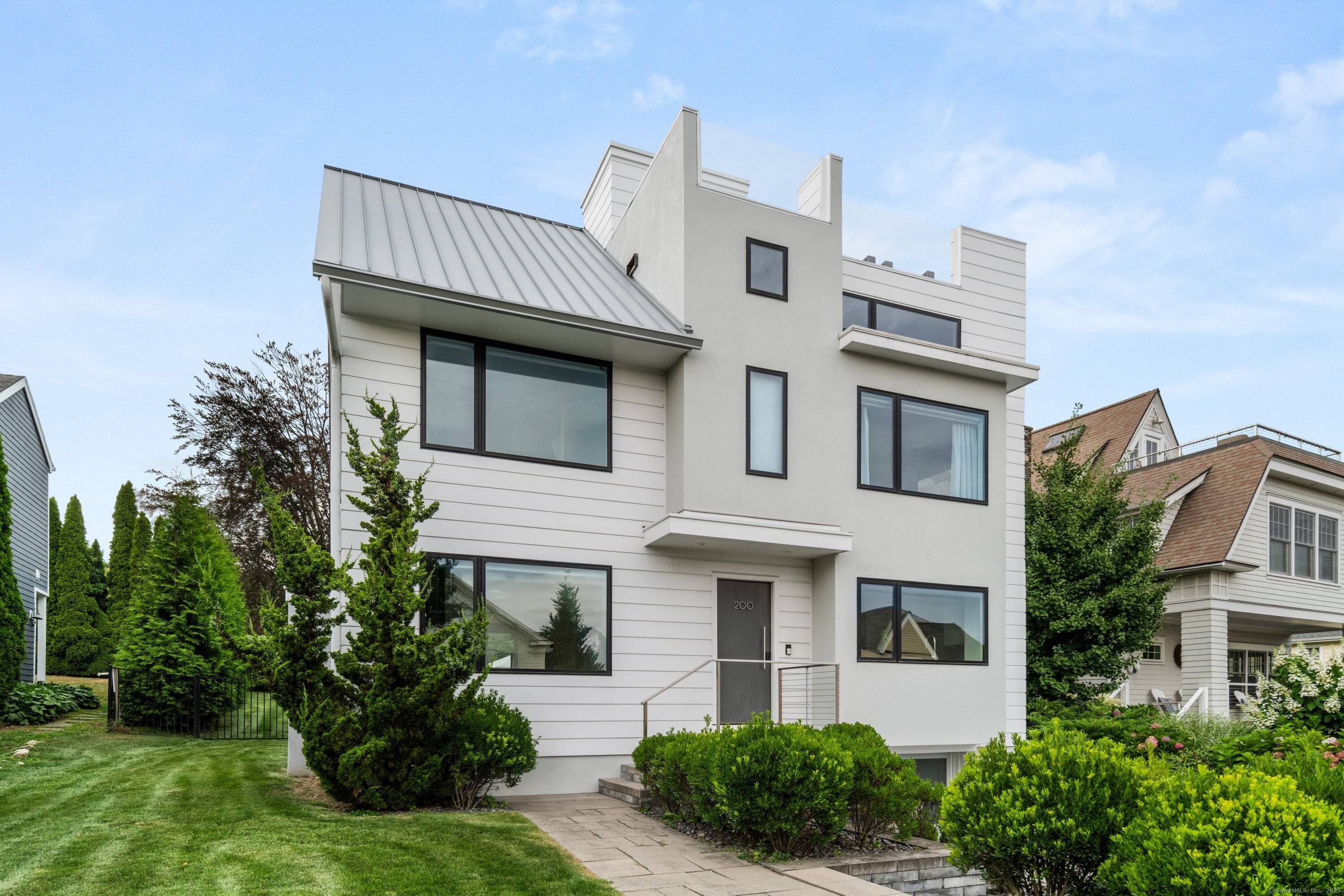 Compo Beach, Westport Short Term Rental Experience the magic of waterfront living at this 3BD 2.