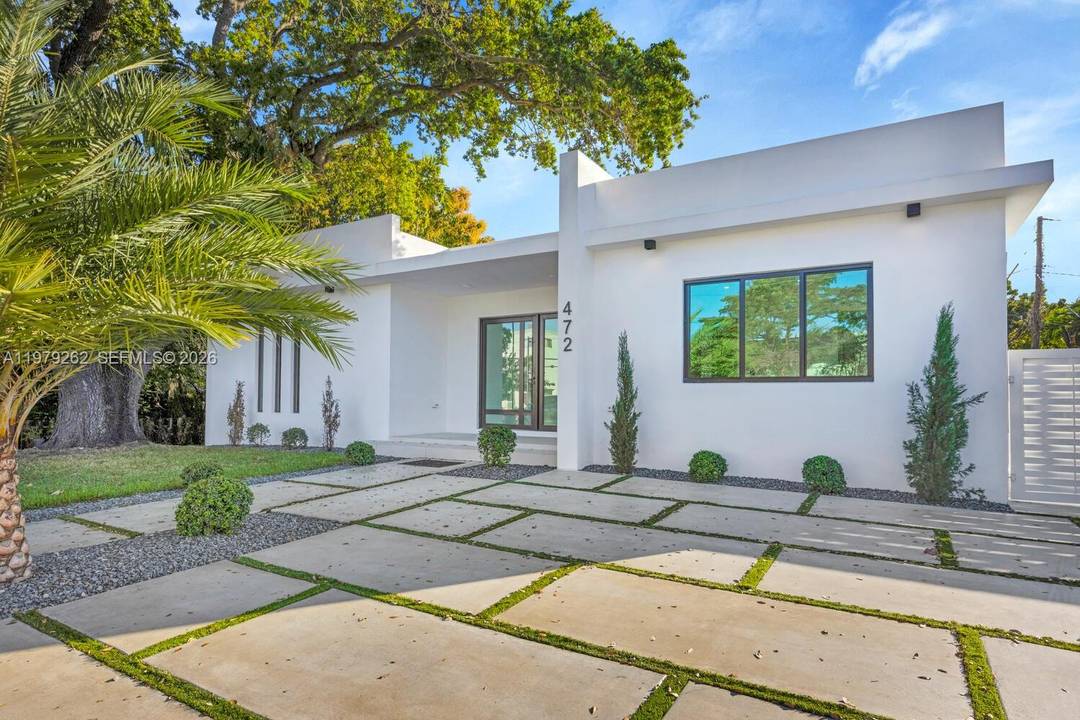 Experience modern living in Miami Springs with this newly built residence offering 4 spacious bedrooms amp ; 3.