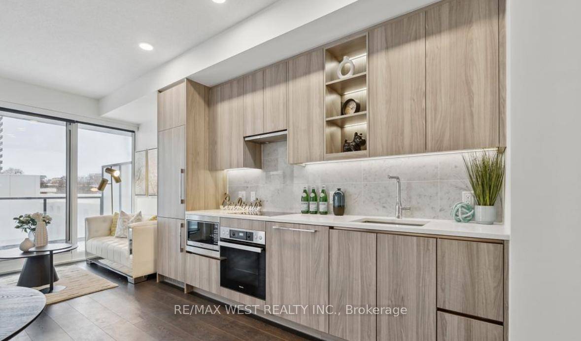 This Bright and Open 1 Bedroom amp ; Den Condo At Seasons In Concord Park Place, Featuring A Stunning West View amp ; A Large Balcony.