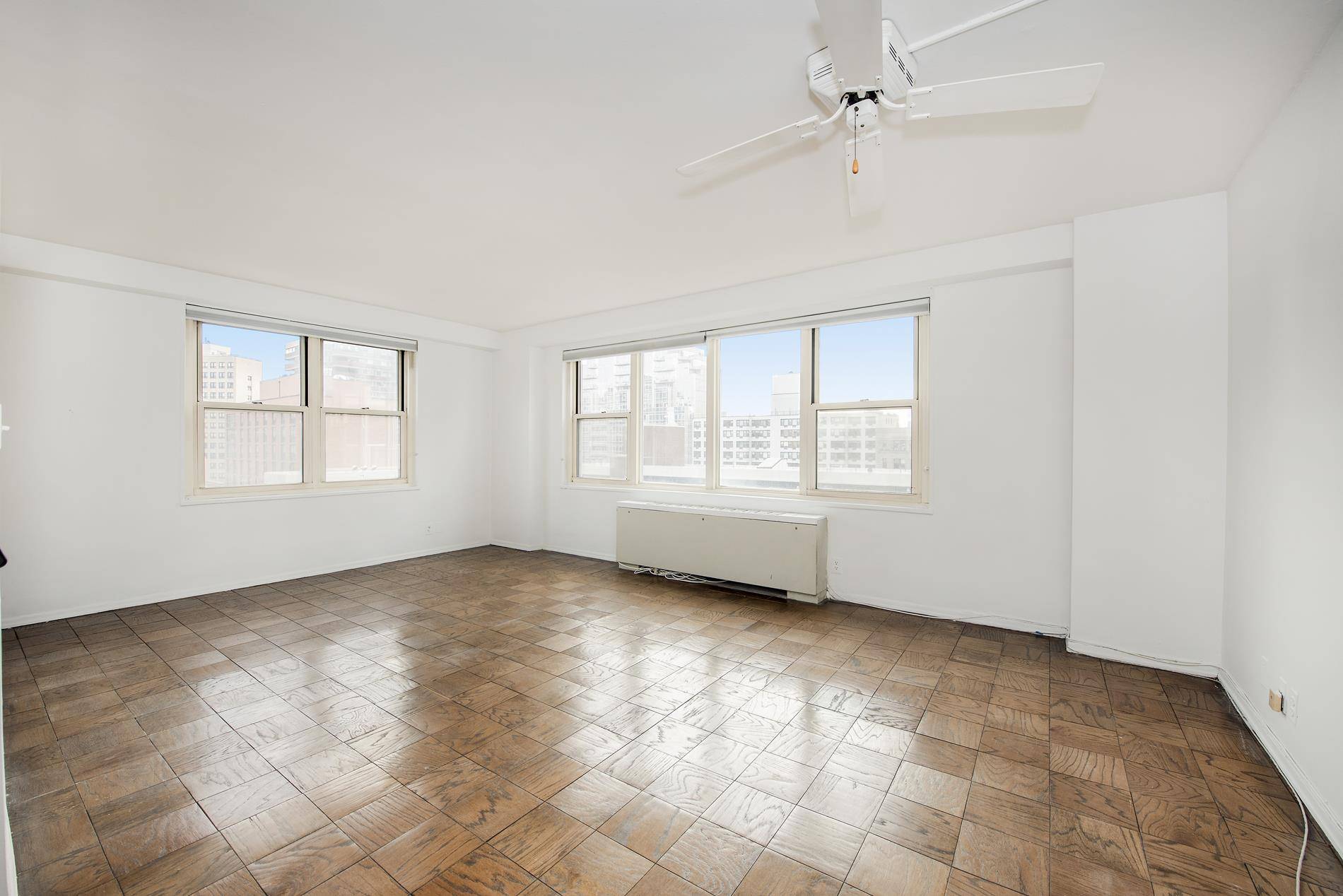 Make this corner unit on the 14th floor, with low maintenance, your private oasis in the city !
