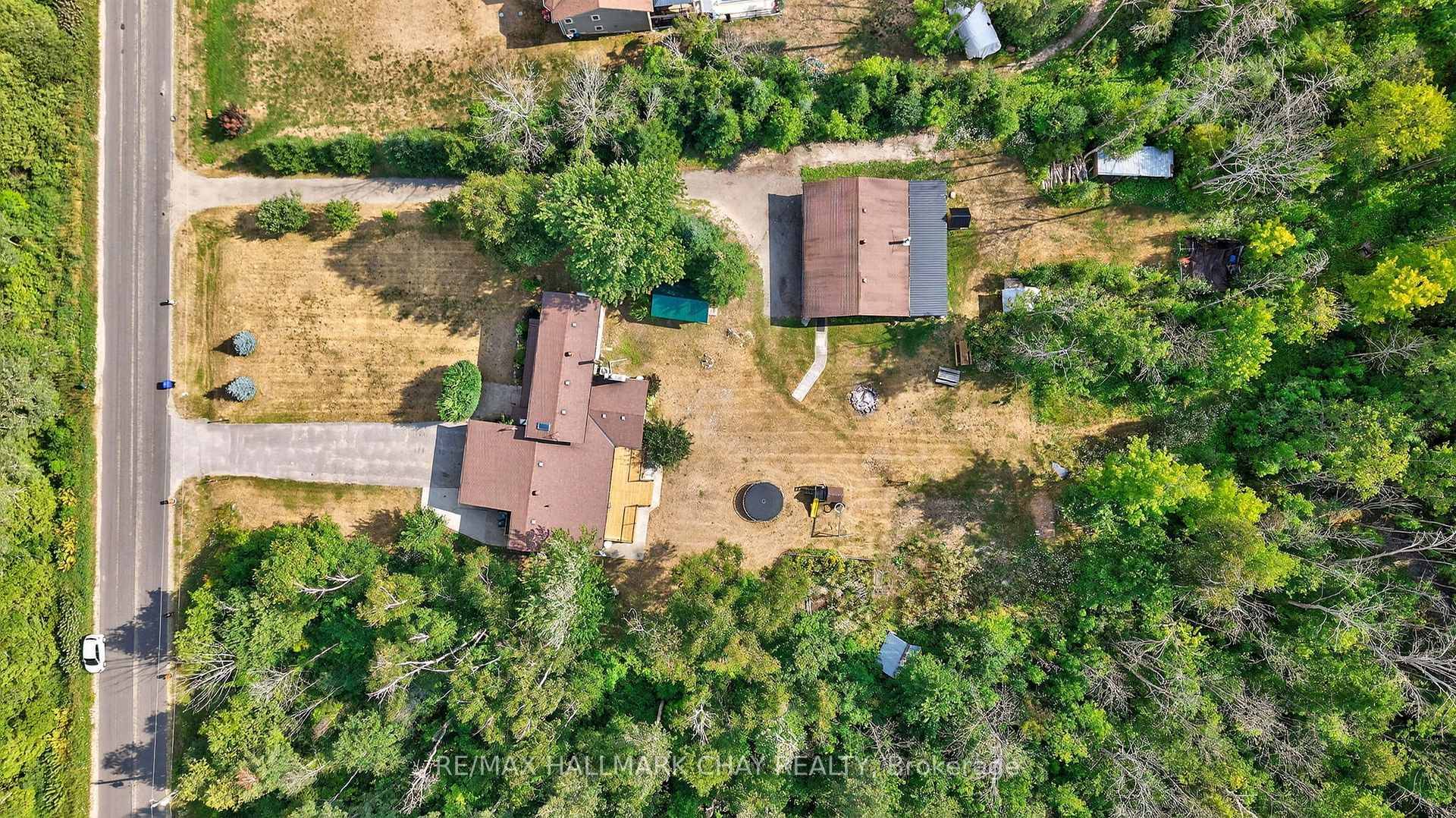 Executive Family Home Nestled On 10 Acres Of Private Land With 1, 200 SqFt Detached, Insulated Workshop With Double 7x9Ft Doors, amp ; a second Driveway.