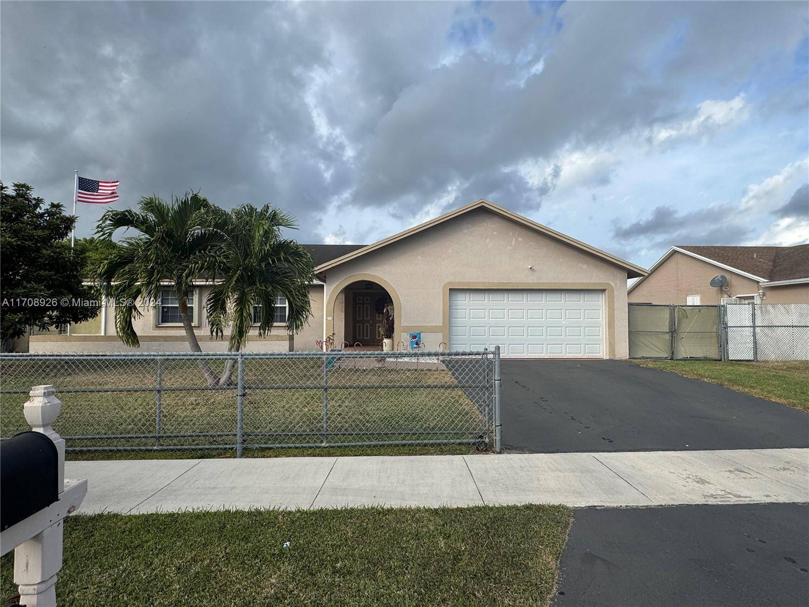 This home features a spacious layout with open living areas and a great backyard perfect for family gatherings.