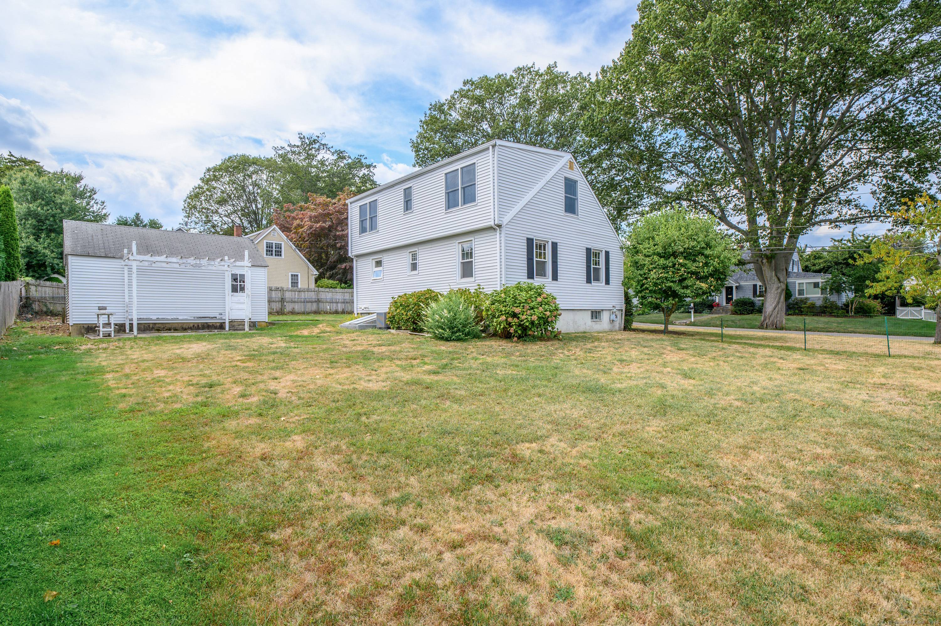 Beach area Rental. The level yard creates a welcoming outdoor environment, perfect for relaxation, gardening, or outdoor activities.