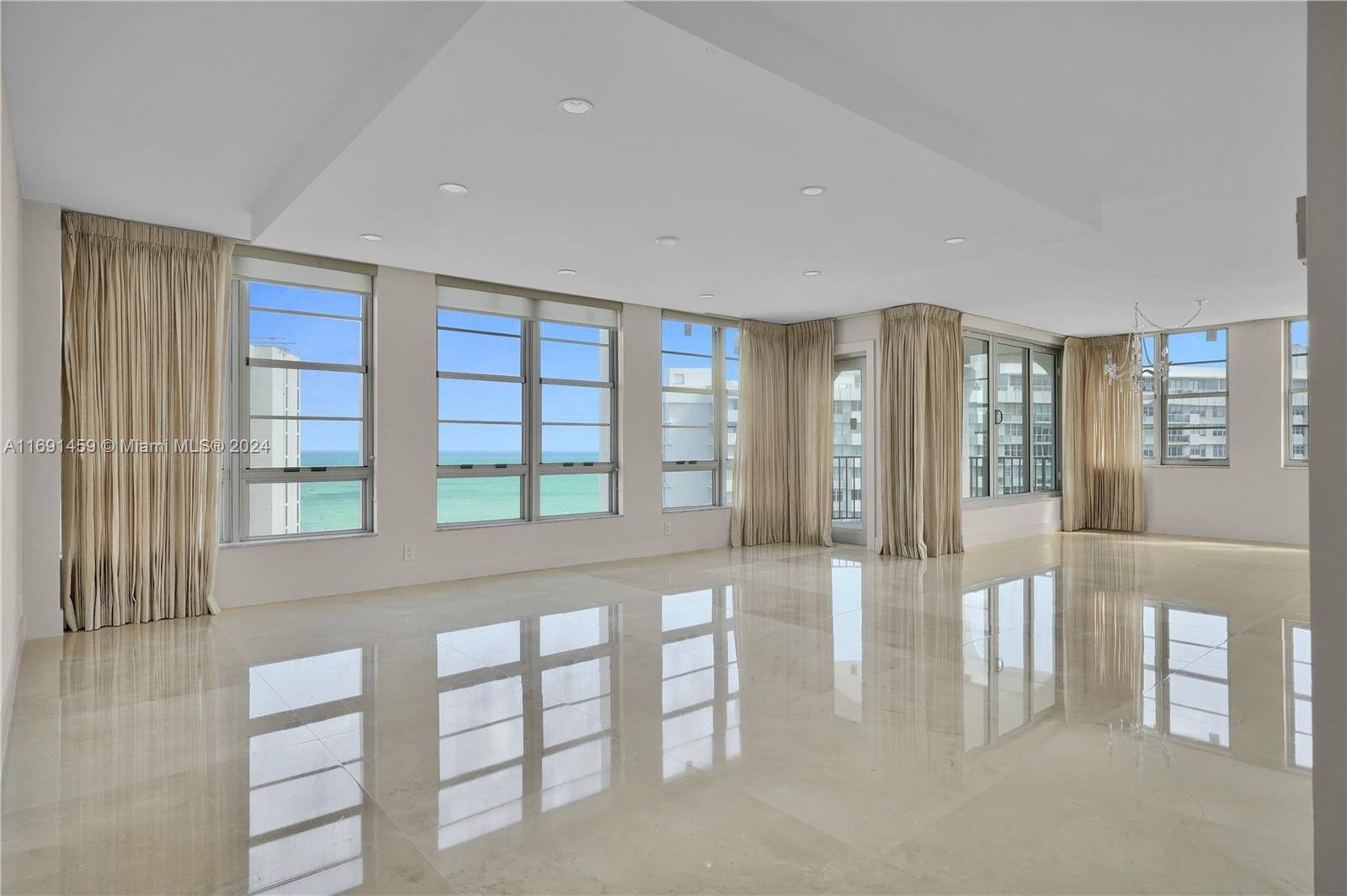 This stunning Miami Beach condo on the 15th floor offers breathtaking ocean and canal views.