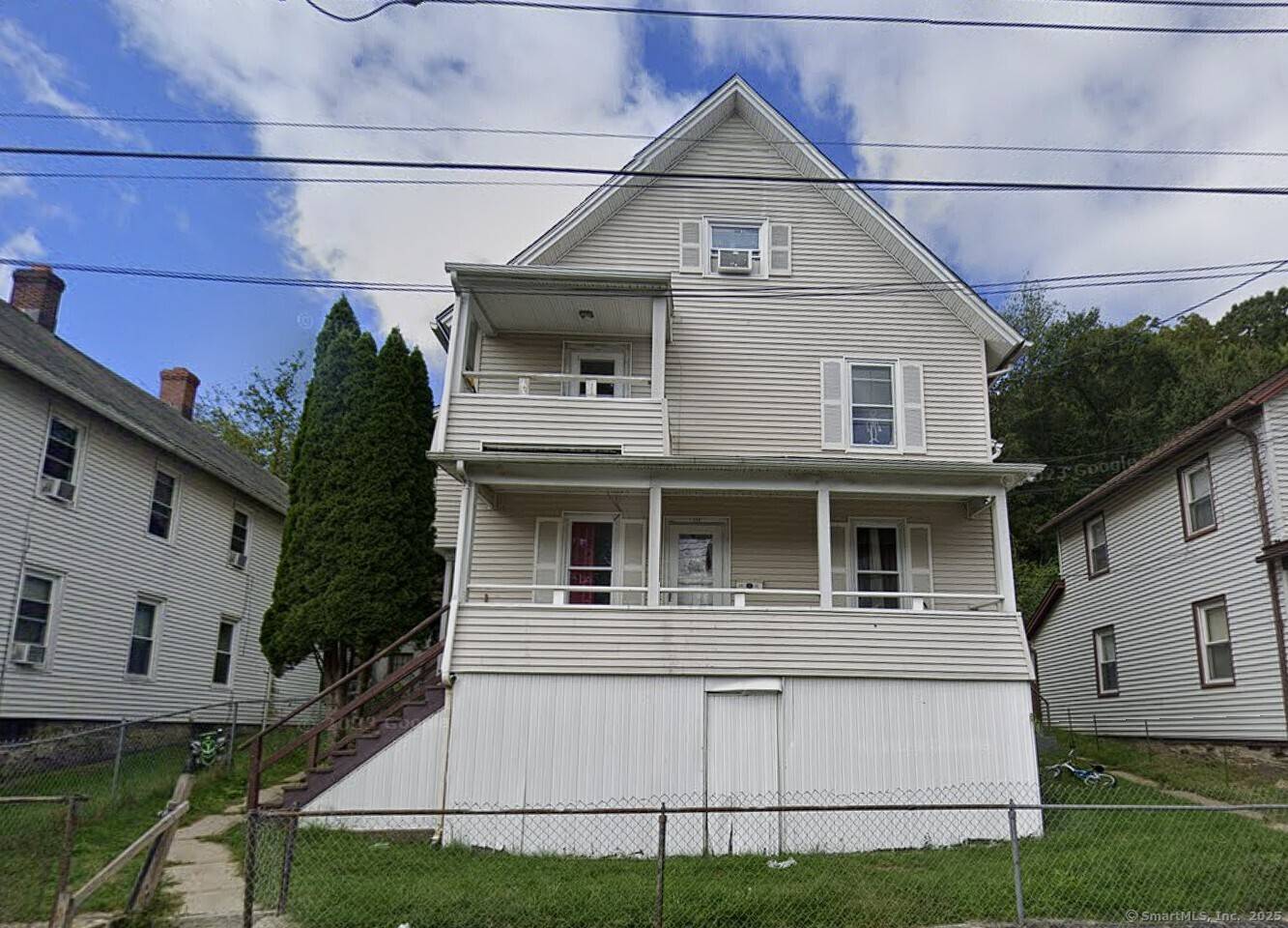 This 3 family home features two desirable walk up duplex style units and a spacious updated 3 bedroom unit on the lower level.