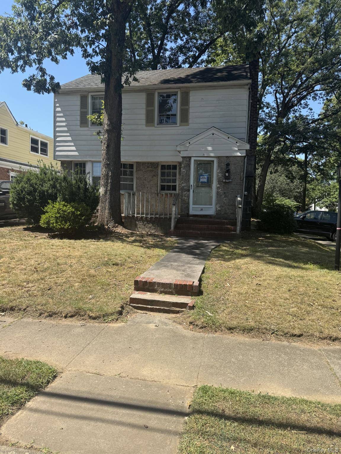 3 BRs 1 Bath Featuring a Spacious Living Room, Formal Dining Room, and Full Basement.