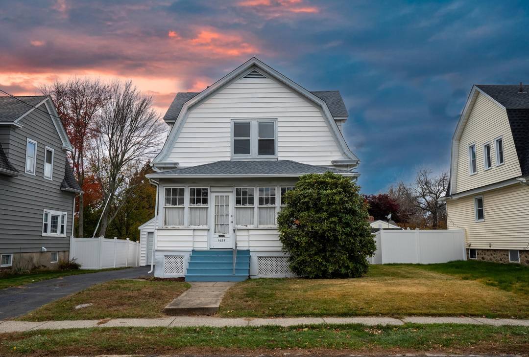 Oversized 1913 Dutch Colonial with classic character.
