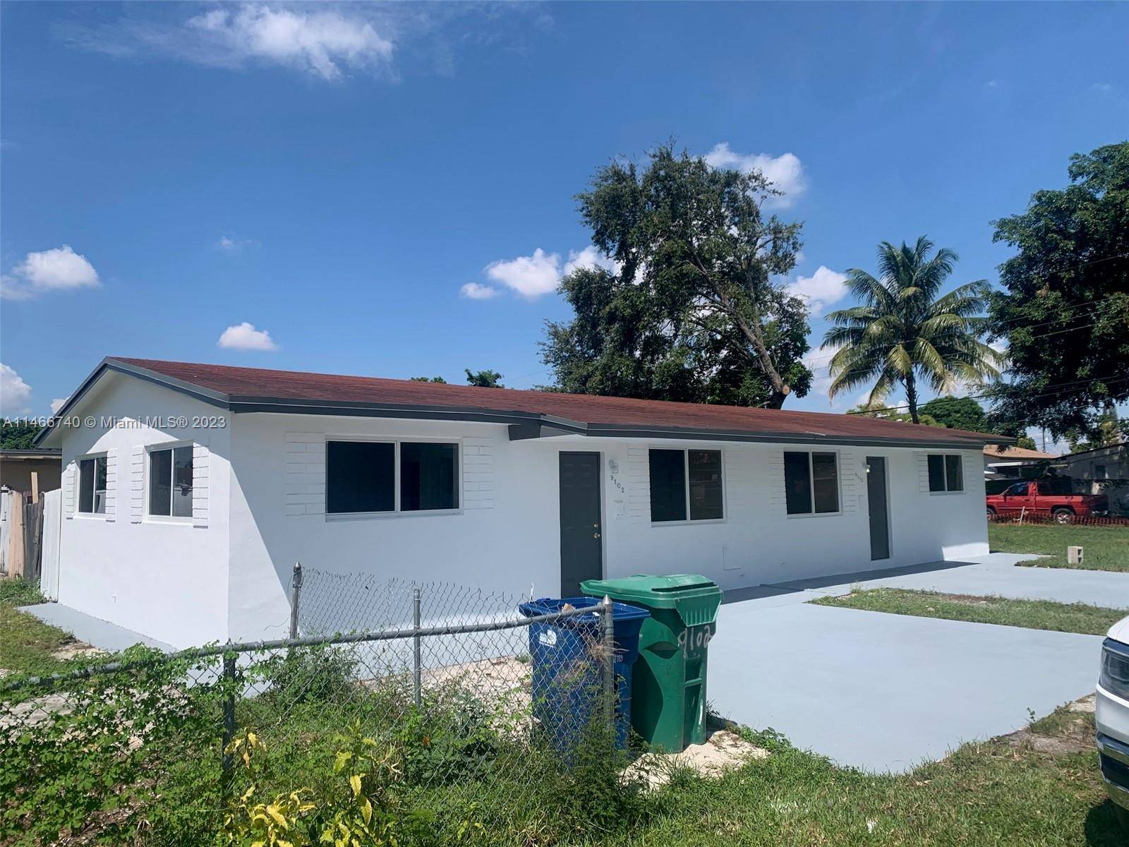 Completely updated corner unit with lots of parking and yard space.
