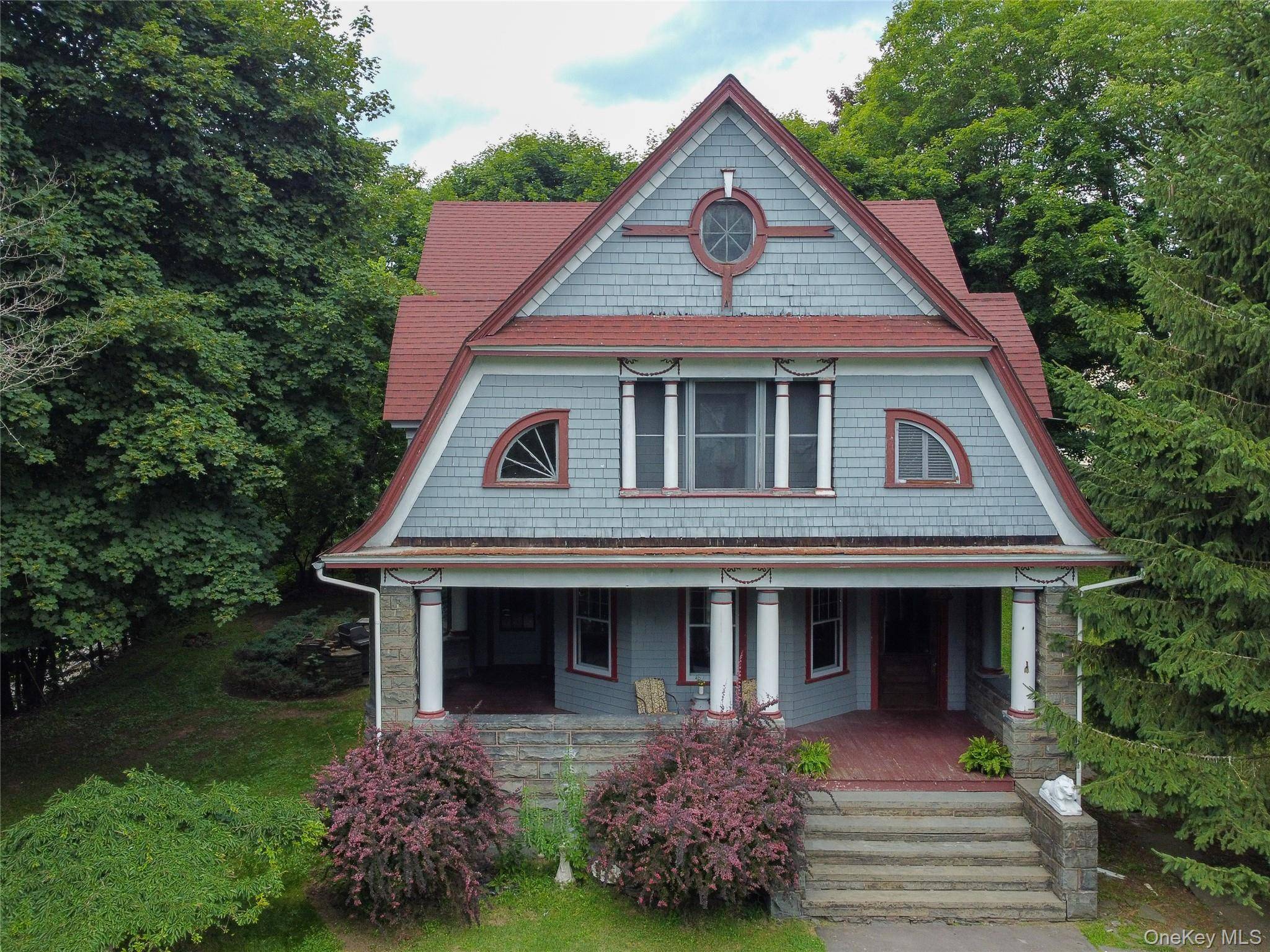 Located at the end of a quiet cul de sac, this stately Victorian home boasts old world charm and overlooks the sweet river town of Callicoon.