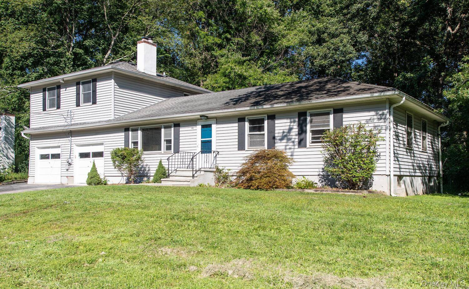 What was once a modest sized ranch has been transformed into 2140 square feet of versatile living space offering five bedrooms ; three of which would make great primary bedrooms.