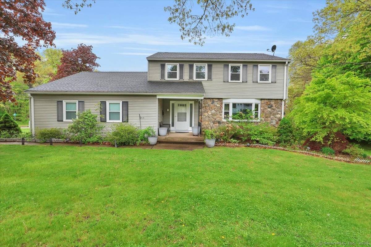 This 4 bedroom, 2 1 2 bath Colonial is move in ready !