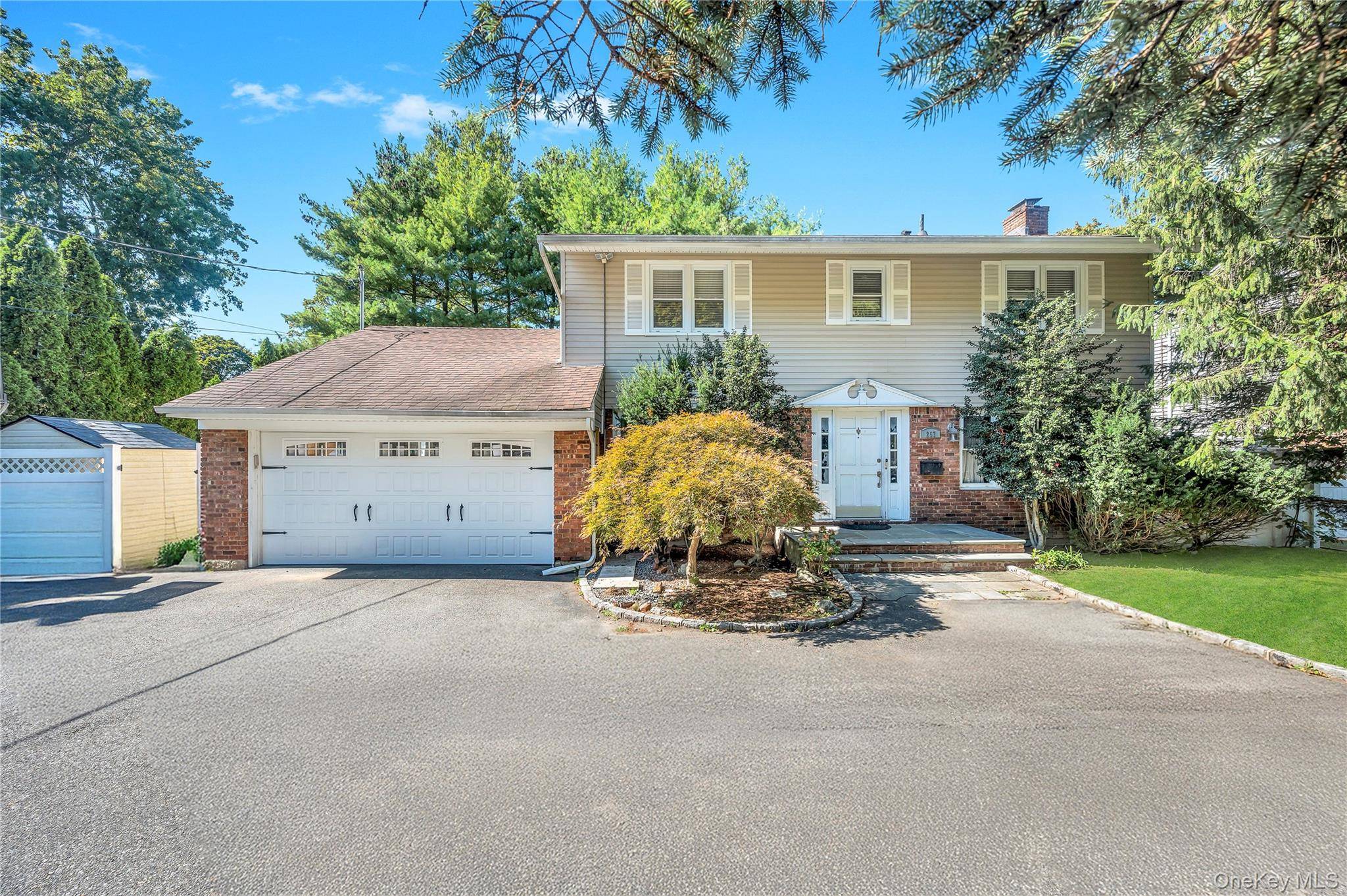 Welcome to 257 Berry Hill Road in Syosset !