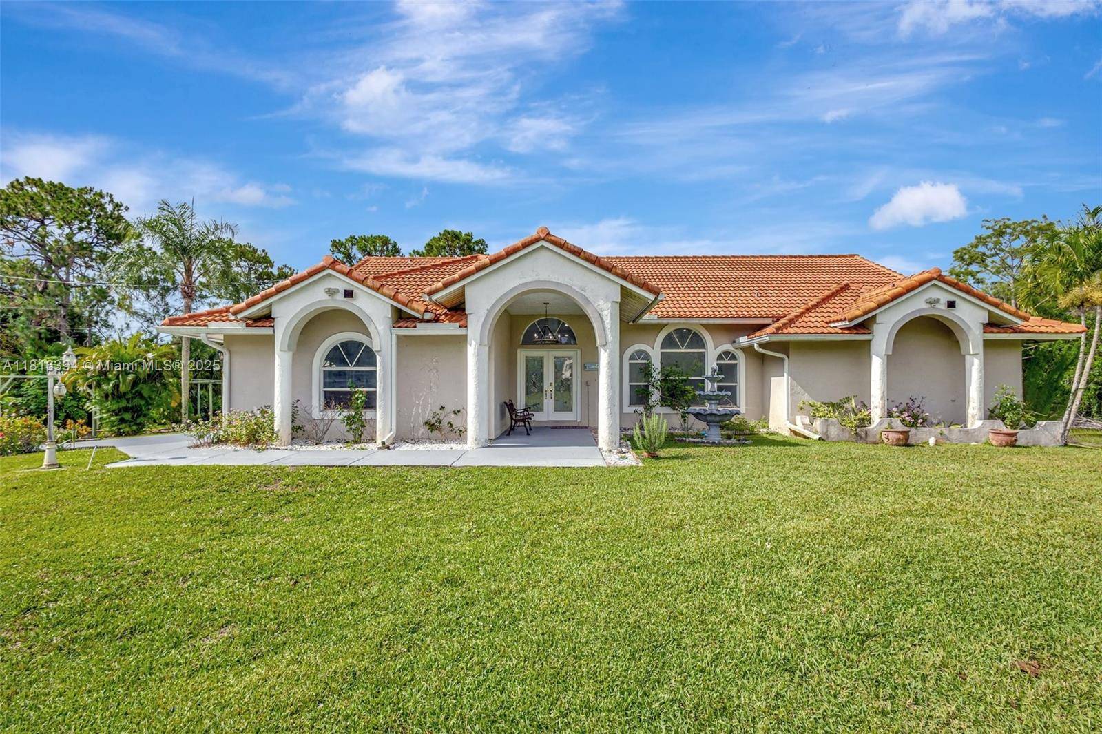Experience luxury living surrounded by nature in this beautifully upgraded 4 bedroom, 2 bath home on 1.
