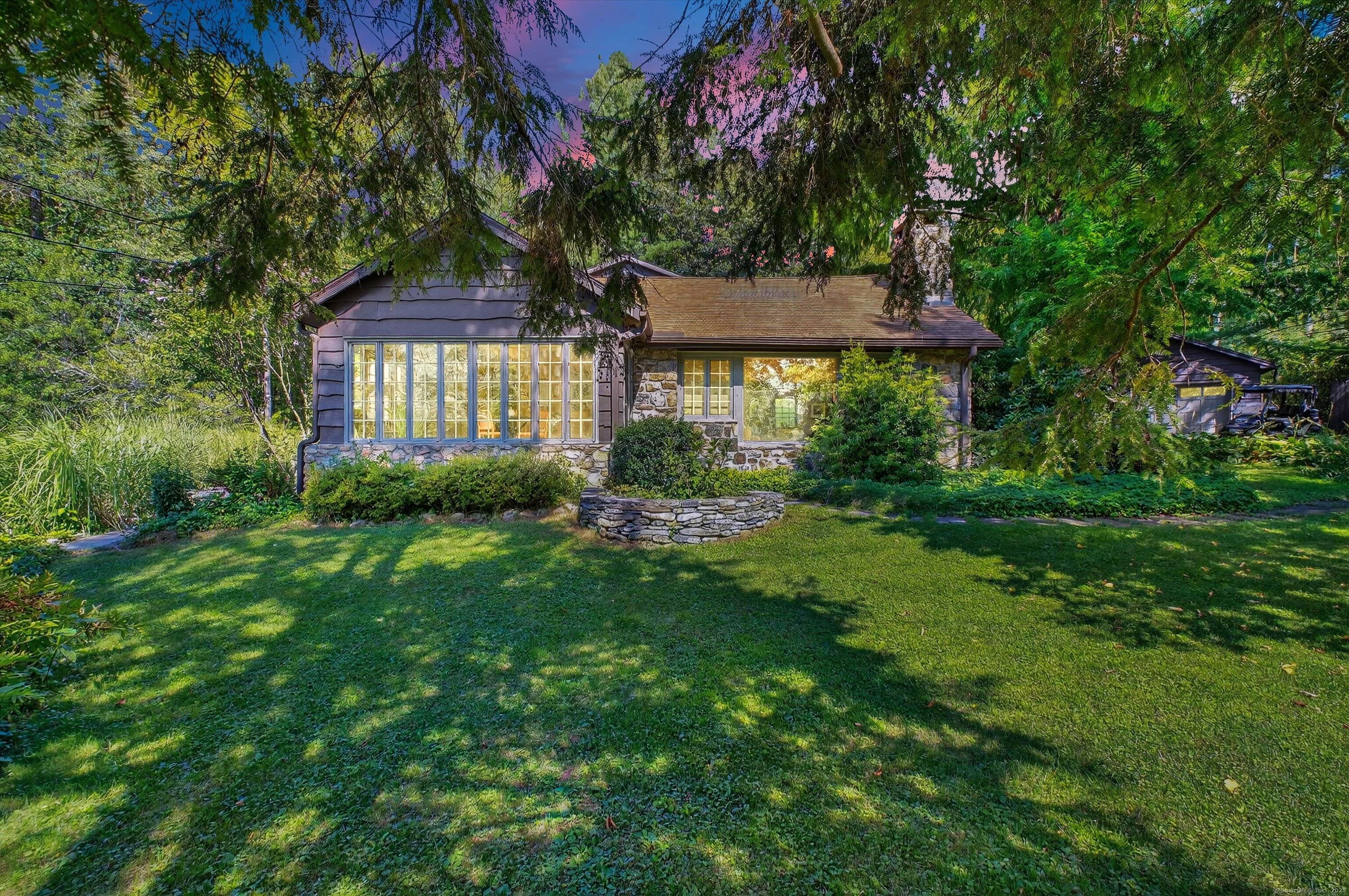 Quintessential lake home in the highly sought after Candlewood Lake Club !