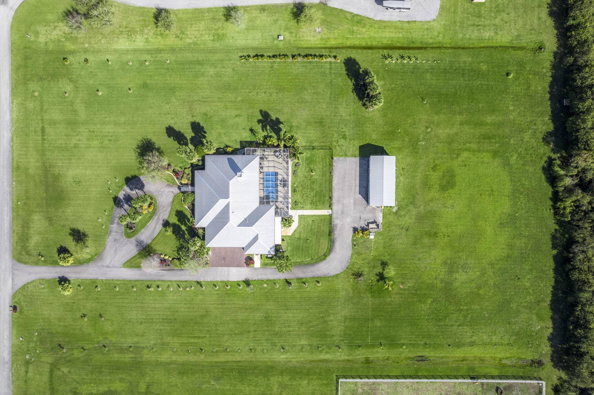 8135 White Fences Lane Private Multi generational Acreage Estate with Endless PossibilitiesWelcome to 8135 White Fences Lane, a serene and beautifully appointed estate located in one of Vero Beach's most ...