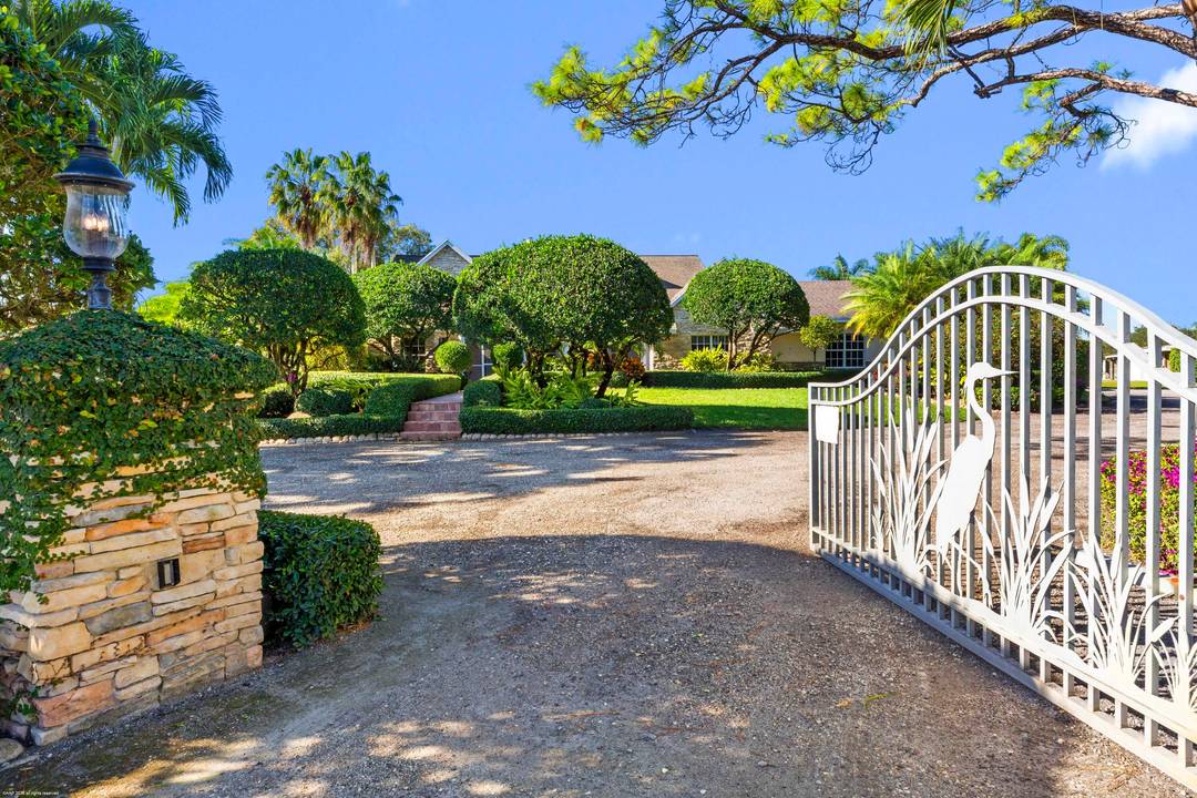 Set on five pristinely manicured, fully irrigated acres in a prime location, this 3 bedroom, 2.