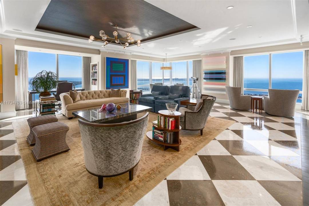 An exquisitely designed corner unit in the prestigious Four Seasons Residences, offering 5, 423 SF of refined luxury.