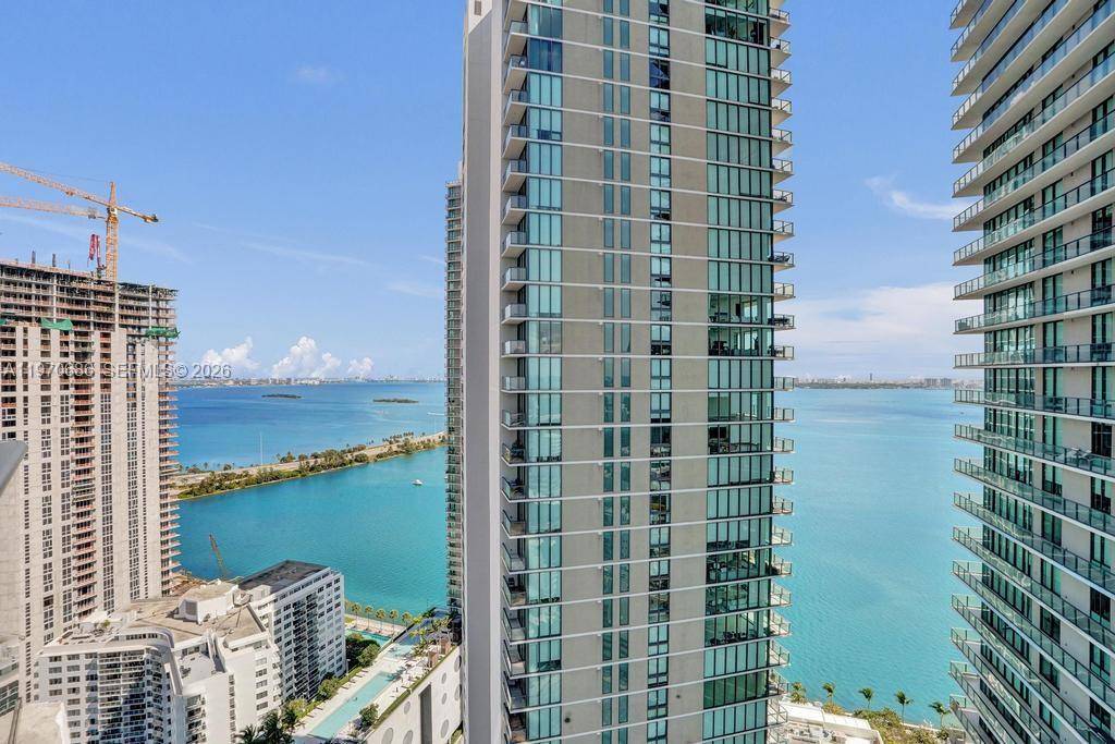 Residence 3306 at Paraiso Bayviews delivers elevated Edgewater living with stunning bay and skyline views from a high floor.