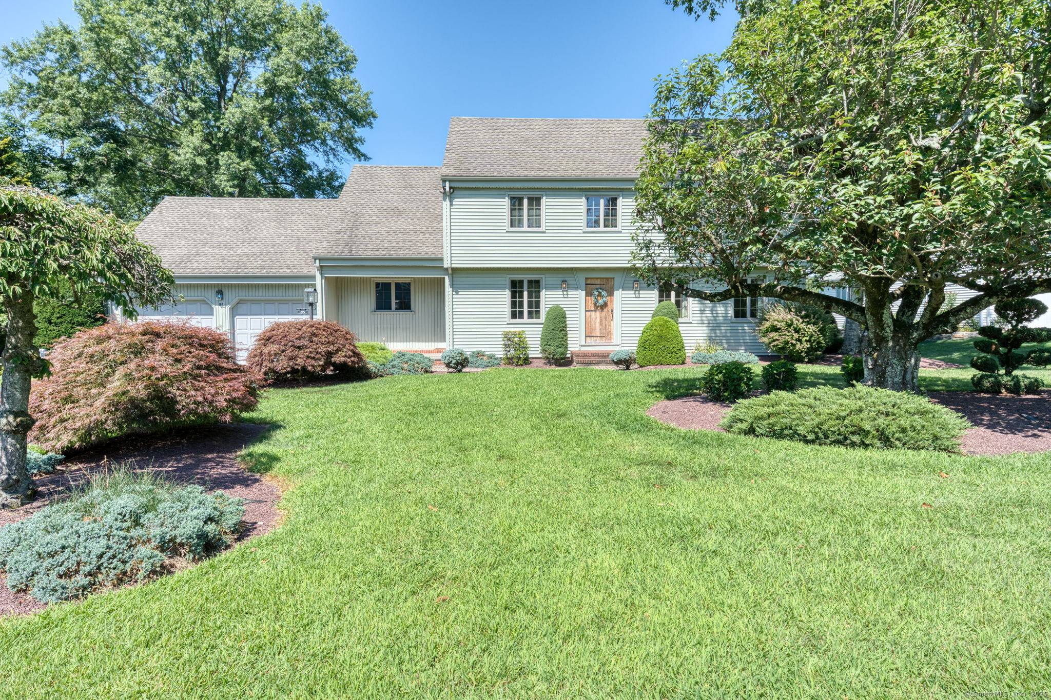 Welcome to this beautifully maintained custom colonial home.