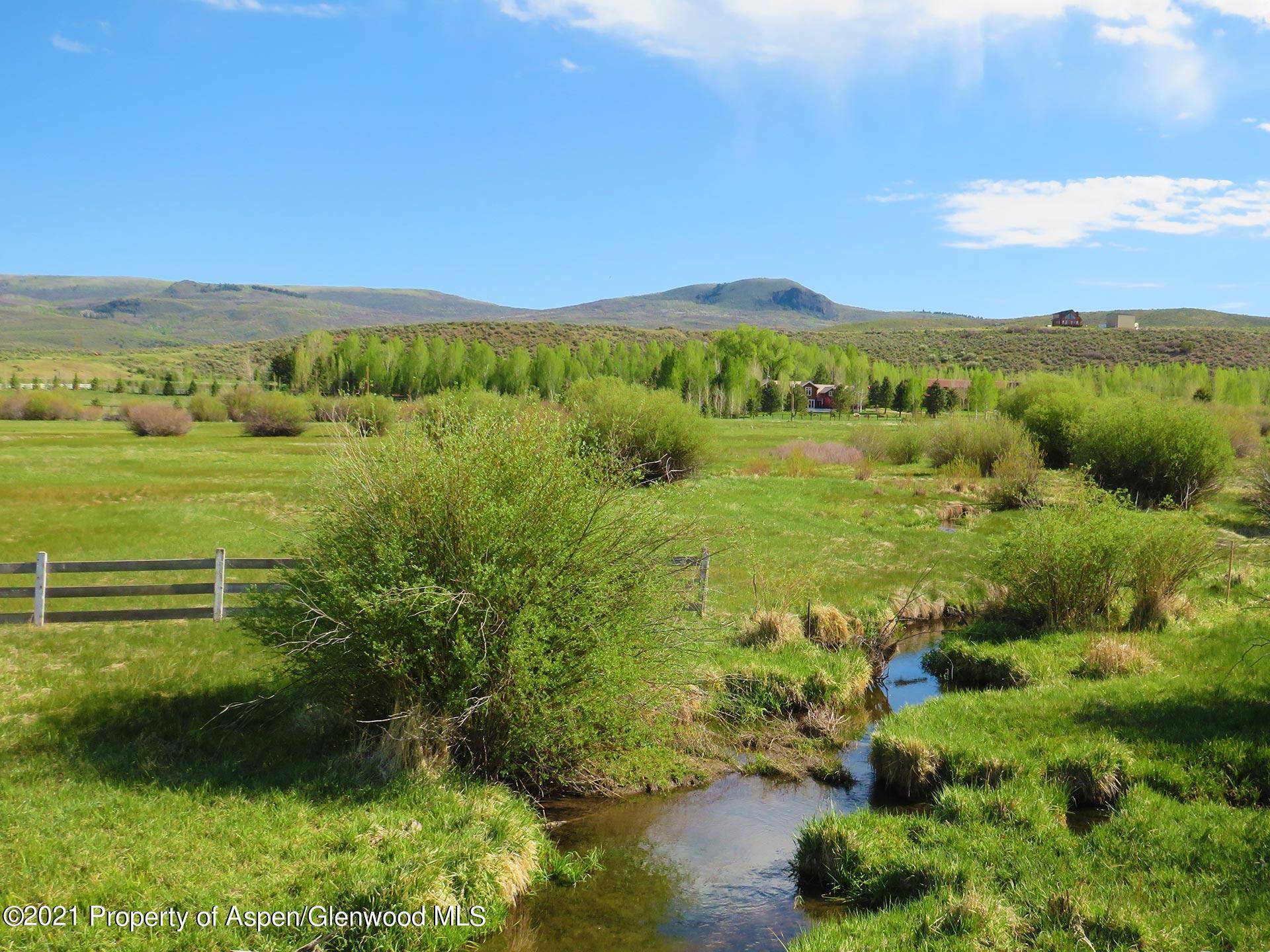 Full Throttle Ranch offers 222 acres with live water, extraordinary improvements, irrigated meadows, equestrian cattle infrastructure, and stunning views 15 minutes from Carbondale and only 45 minutes from Aspen.