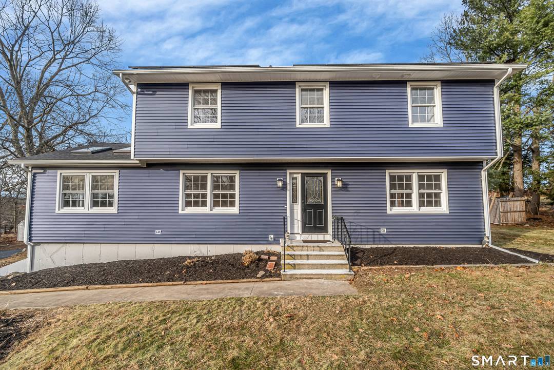 Stunning builder renovated colonial in a highly desirable neighborhood just minutes from the NY border, set on a private, flat 1 acre corner lot.