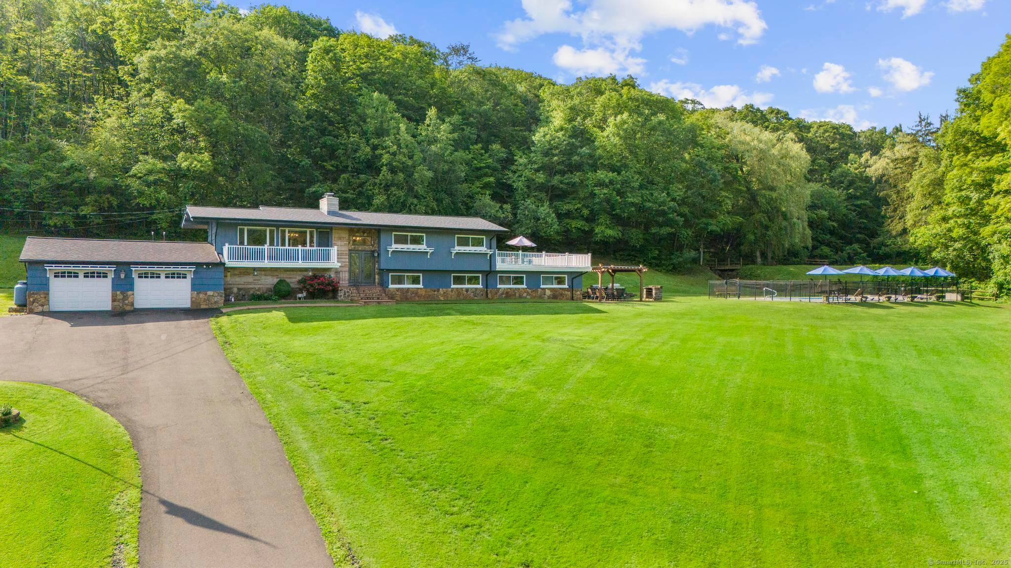 Tucked away on 20. 54 scenic acres, this expansive 5 bedroom, 3.