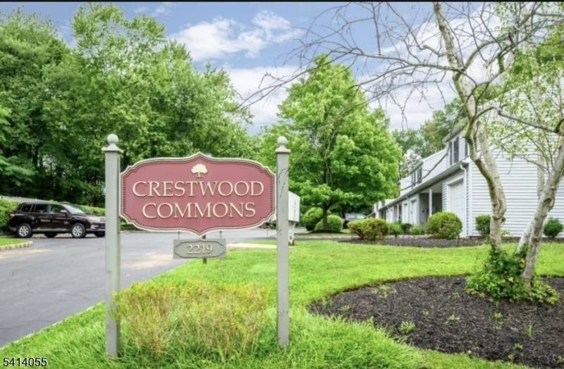 Welcome to this well loved end unit townhome in Crestwood Commons, a quaint community of just 18 residences offering privacy and a peaceful setting.
