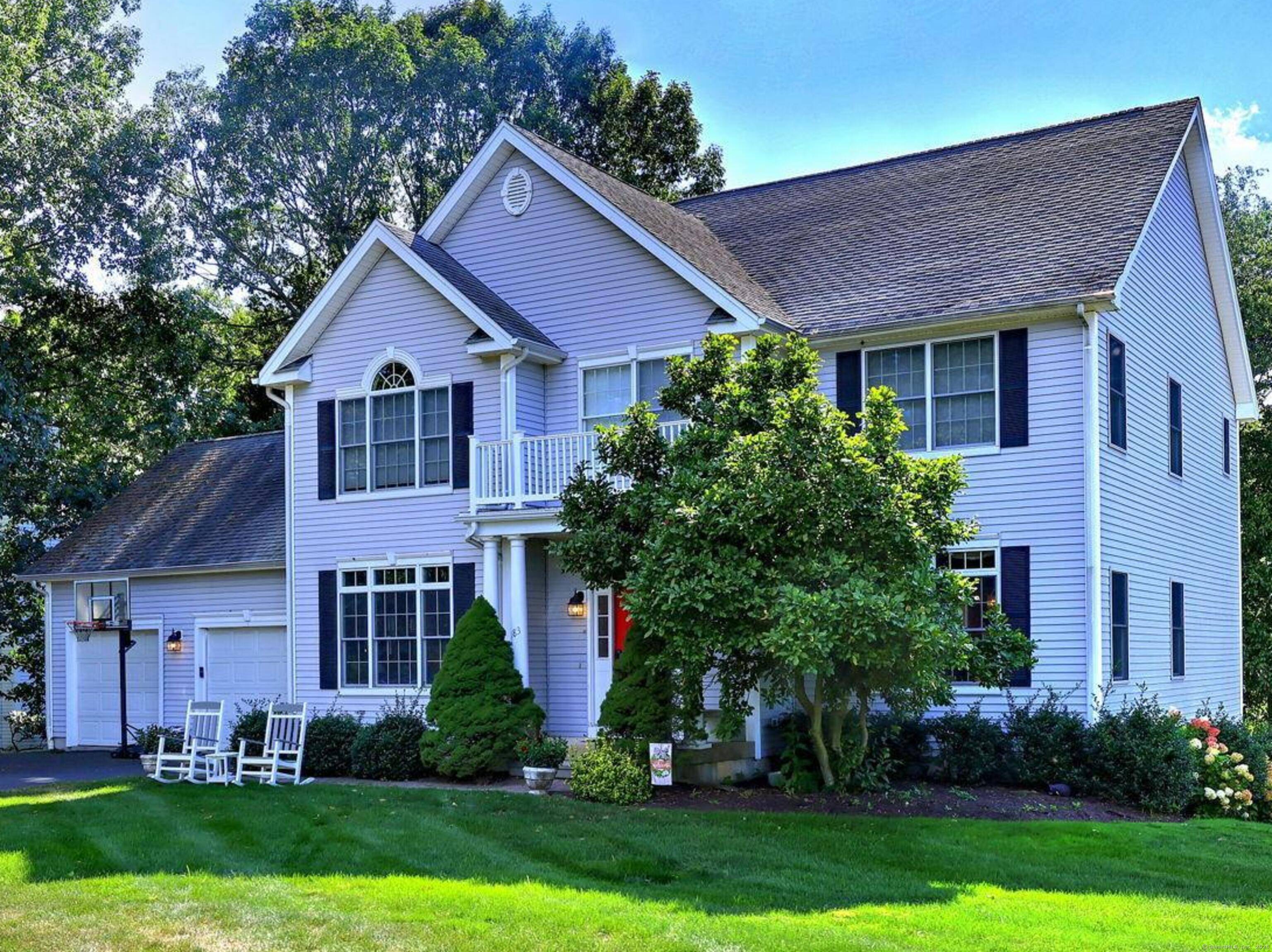 This spacious custom Colonial is nicely perched high on 0.