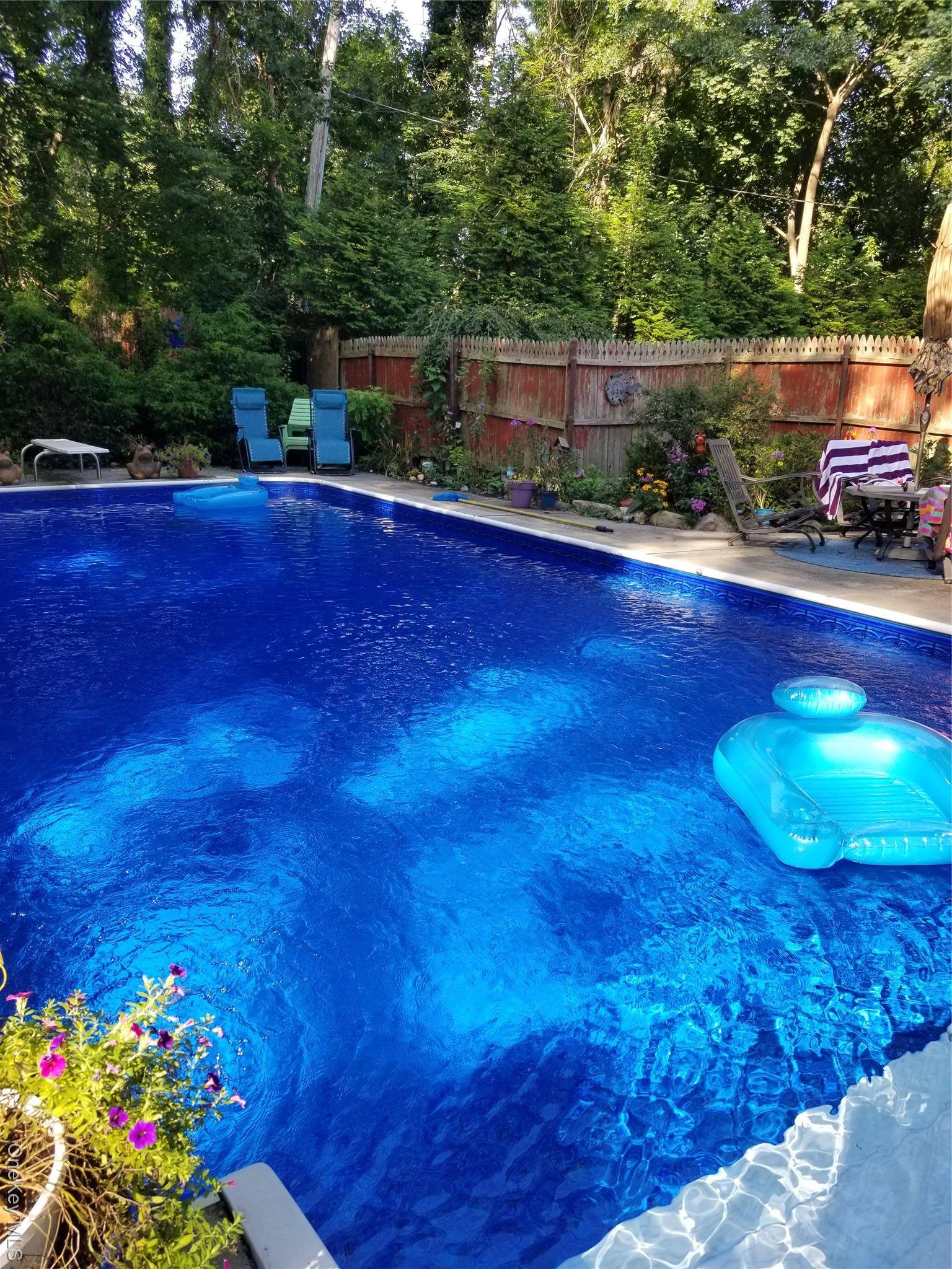 Charming Gambrel Home Offering Year Round Privacy A Private Retreat with Modern Comforts Near North Shore Beaches Nestled on an expansive.