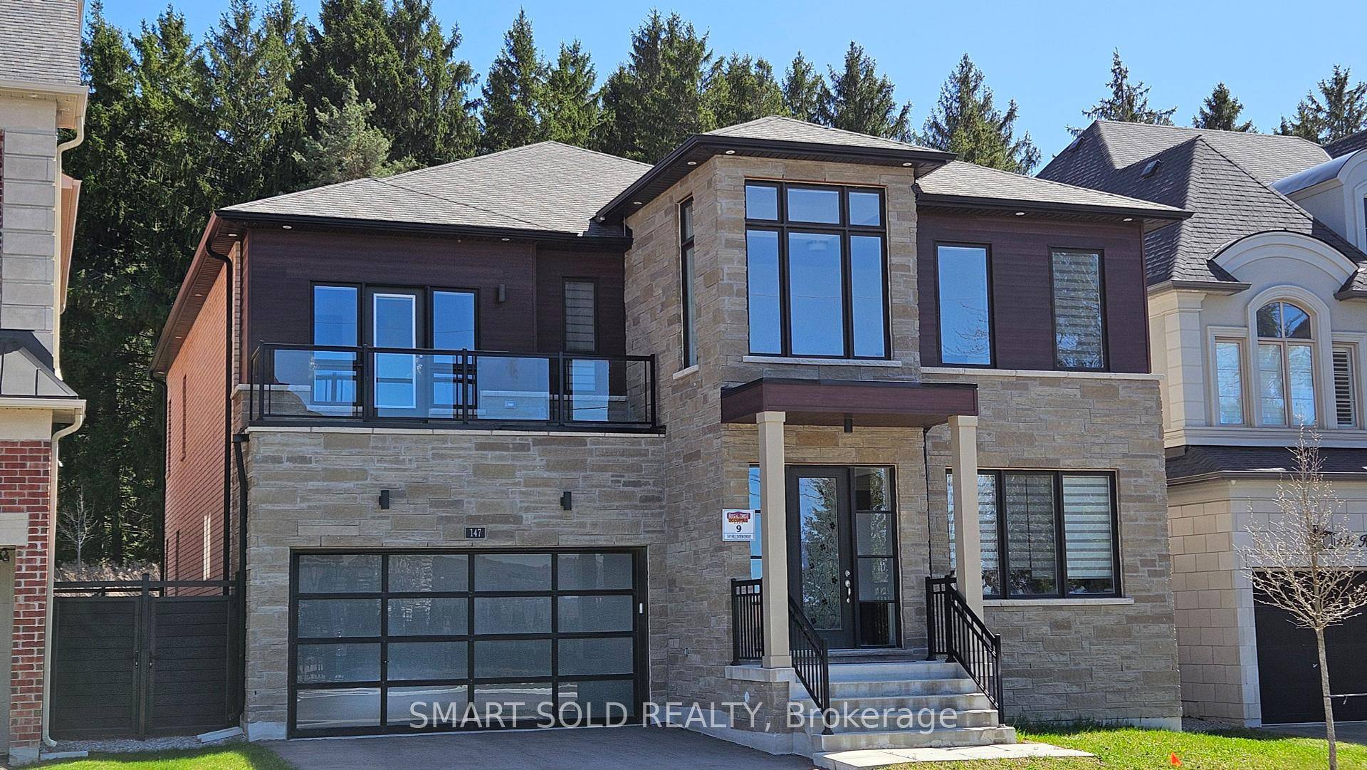 Welcome to 147 Hillsview Drive a stunning executive home on a 50 premium lot backing onto the serene David Dunlap Observatory Woods.
