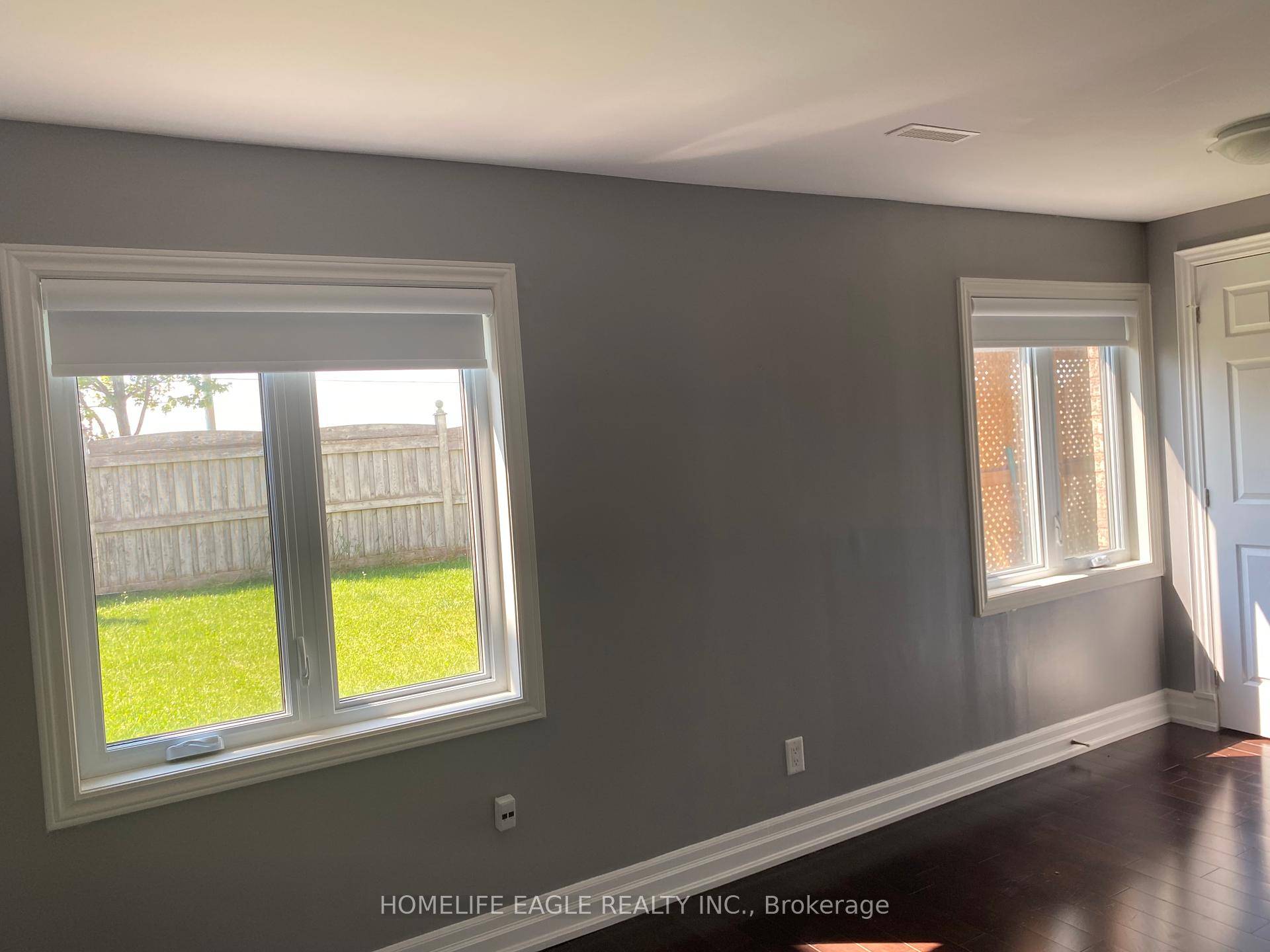 This legal walk out unit feels more like a main floor apartment, its above ground location filled with natural light, and features large windows throughout.