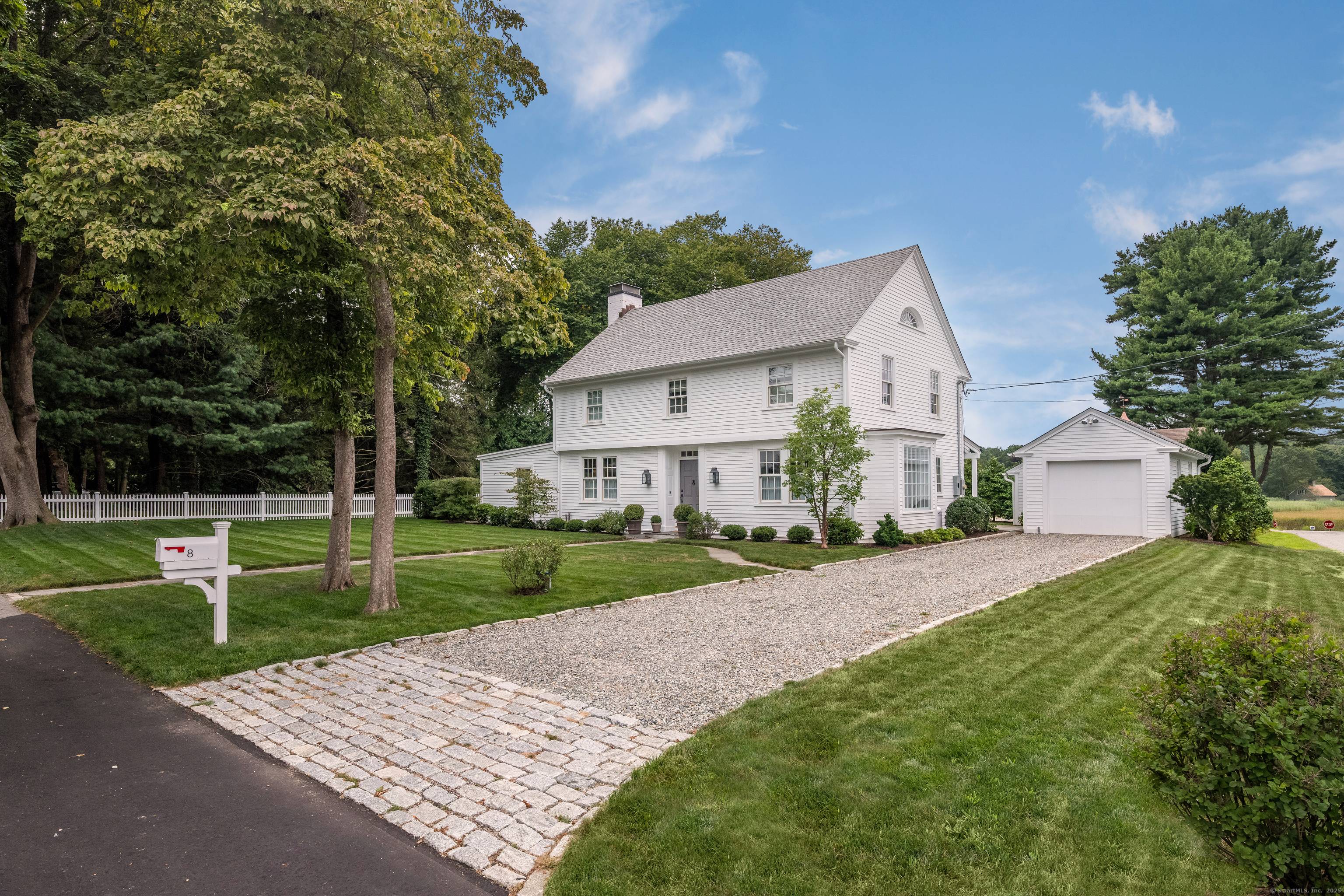 Welcome to 8 Lieutenant River Lane, an exquisitely renovated colonial in the heart of Old Lyme Village, where timeless charm meets contemporary luxury.