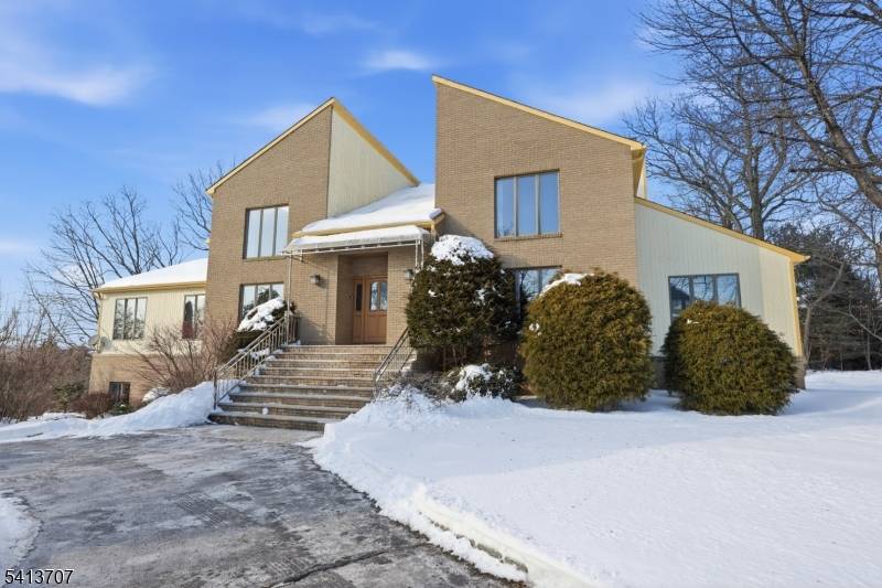 Welcome to 32 Sylvan Drive, an exceptional residence in prestigious Windsor Woods neighborhood.