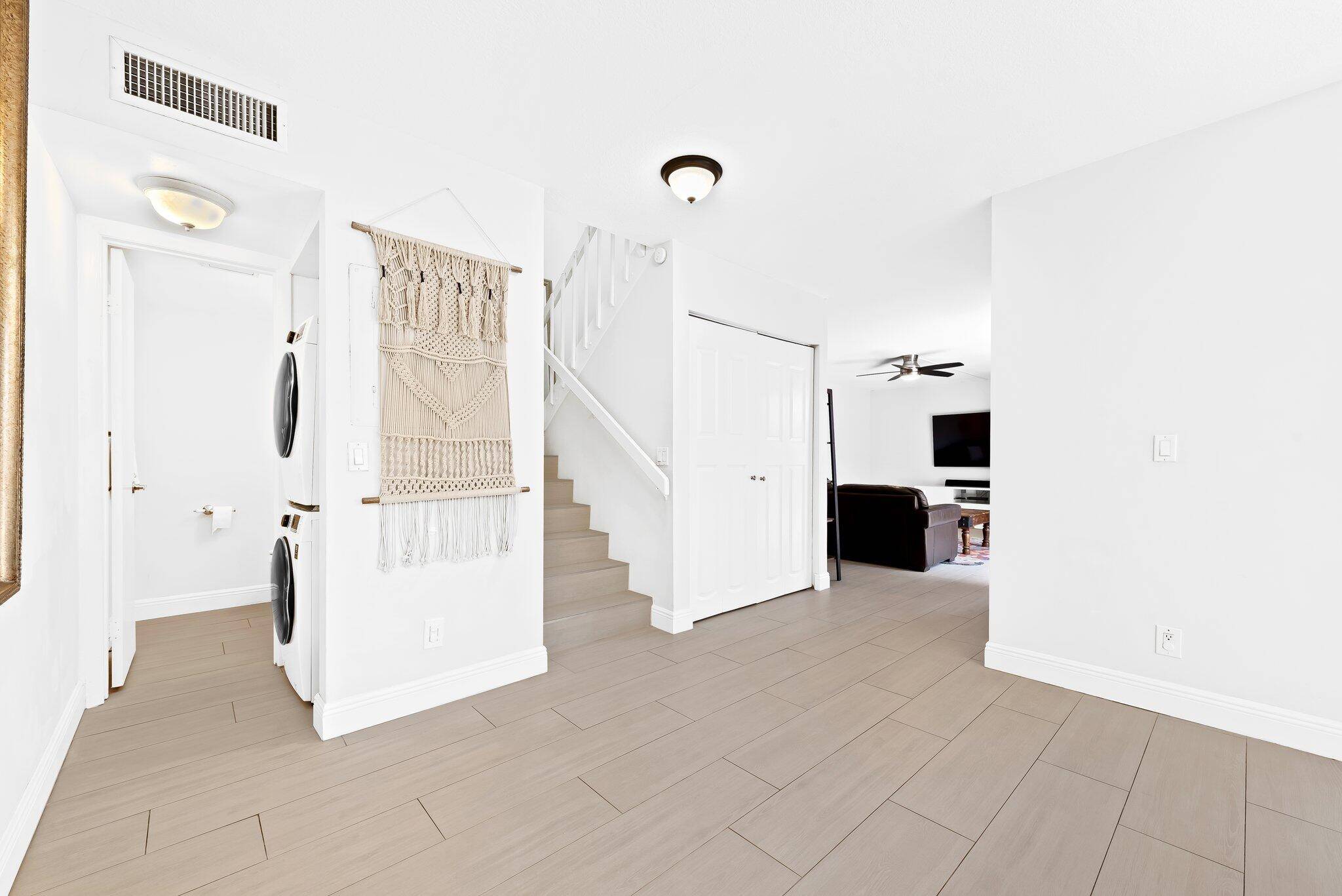 Move right into this stylish, updated townhome featuring a private fenced courtyard perfect for outdoor dining or relaxing, and a Brand New Roof !