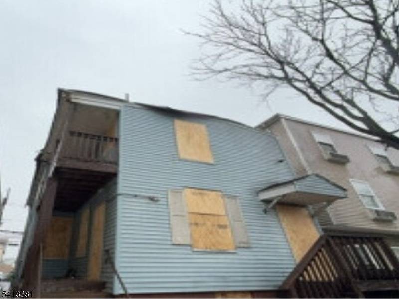 The property is boarded with no access and deemed a safety risk, so all potential buyersare asked to check with city and tax records to determine actual bedroom, bathroomcounts.