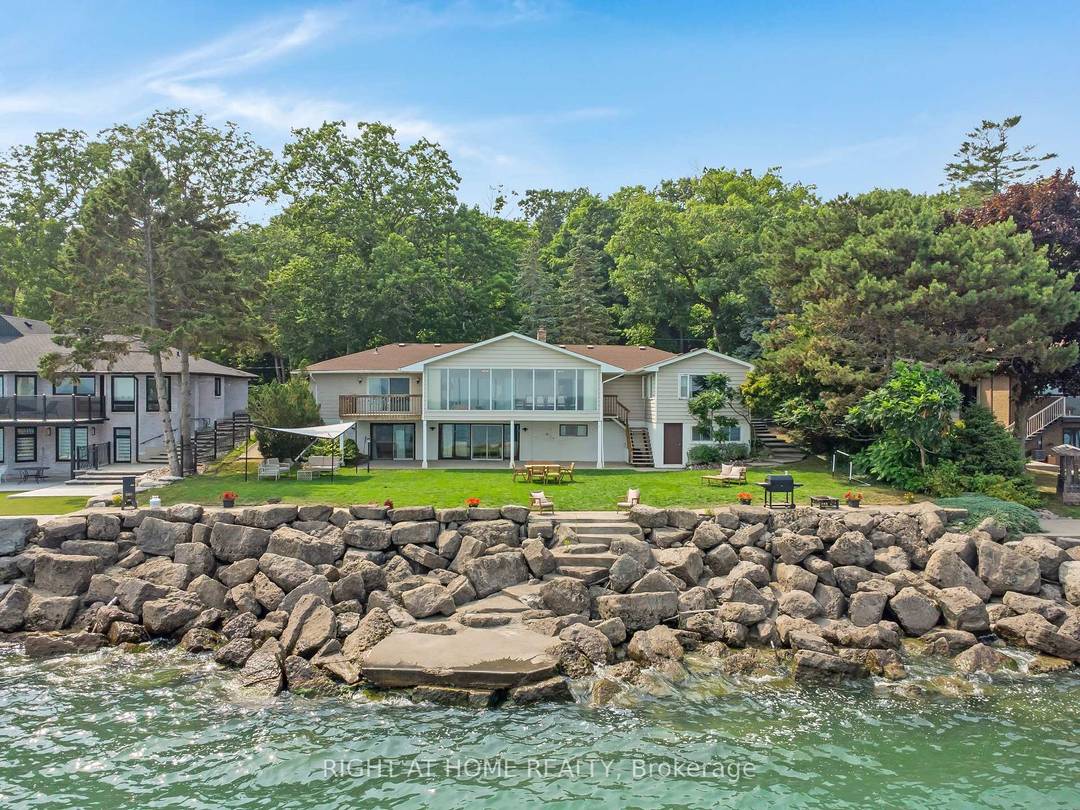 Welcome to an exceptional opportunity on Lakeshore Road, an extraordinary 100ft wide waterfront lot w direct shoreline access and breathtaking views of Lake Ontario, including the Toronto city skyline.