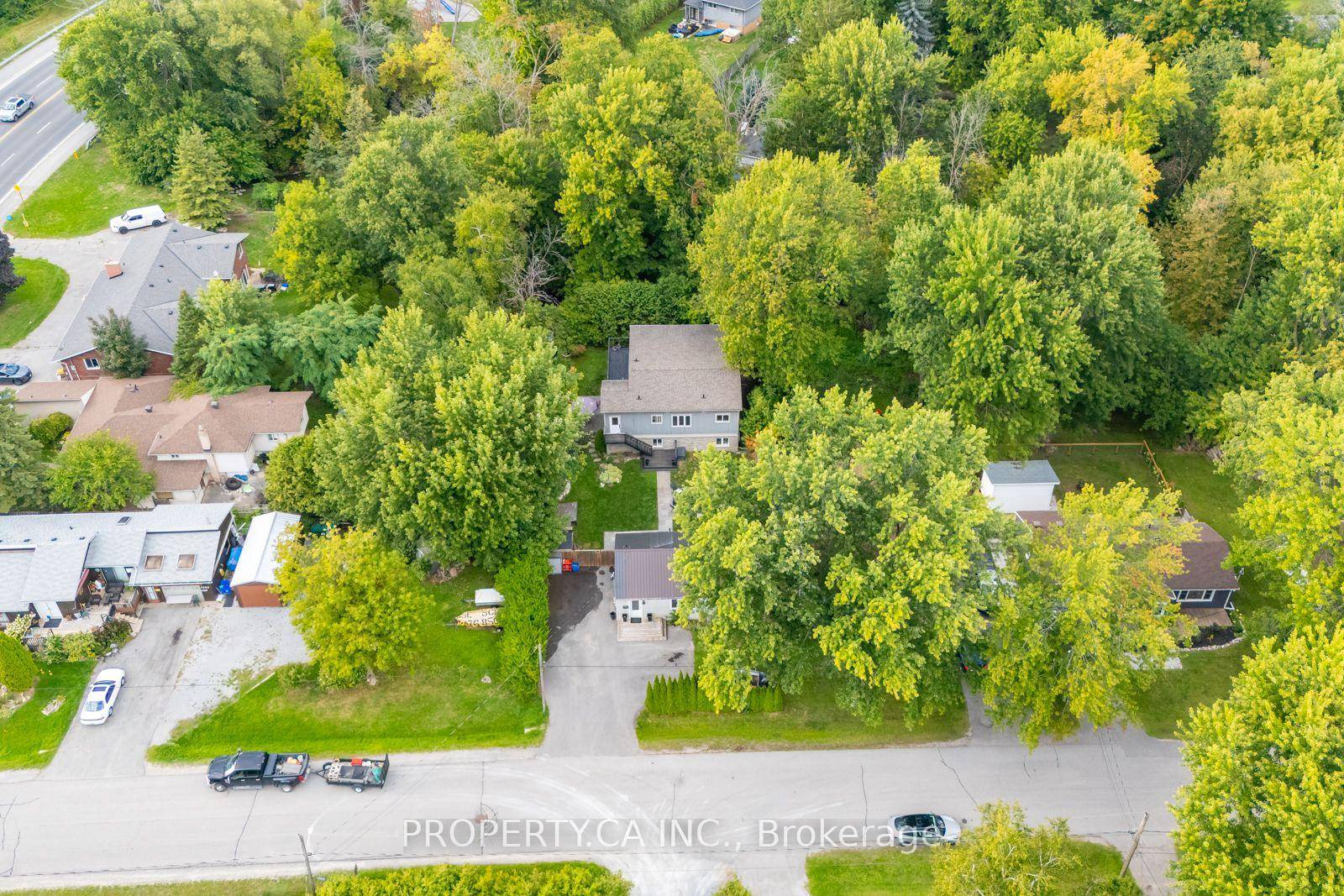 Discover an exceptional property featuring two fully renovated, self contained living spaces on one lot, just steps from the shores of Lake Simcoe.