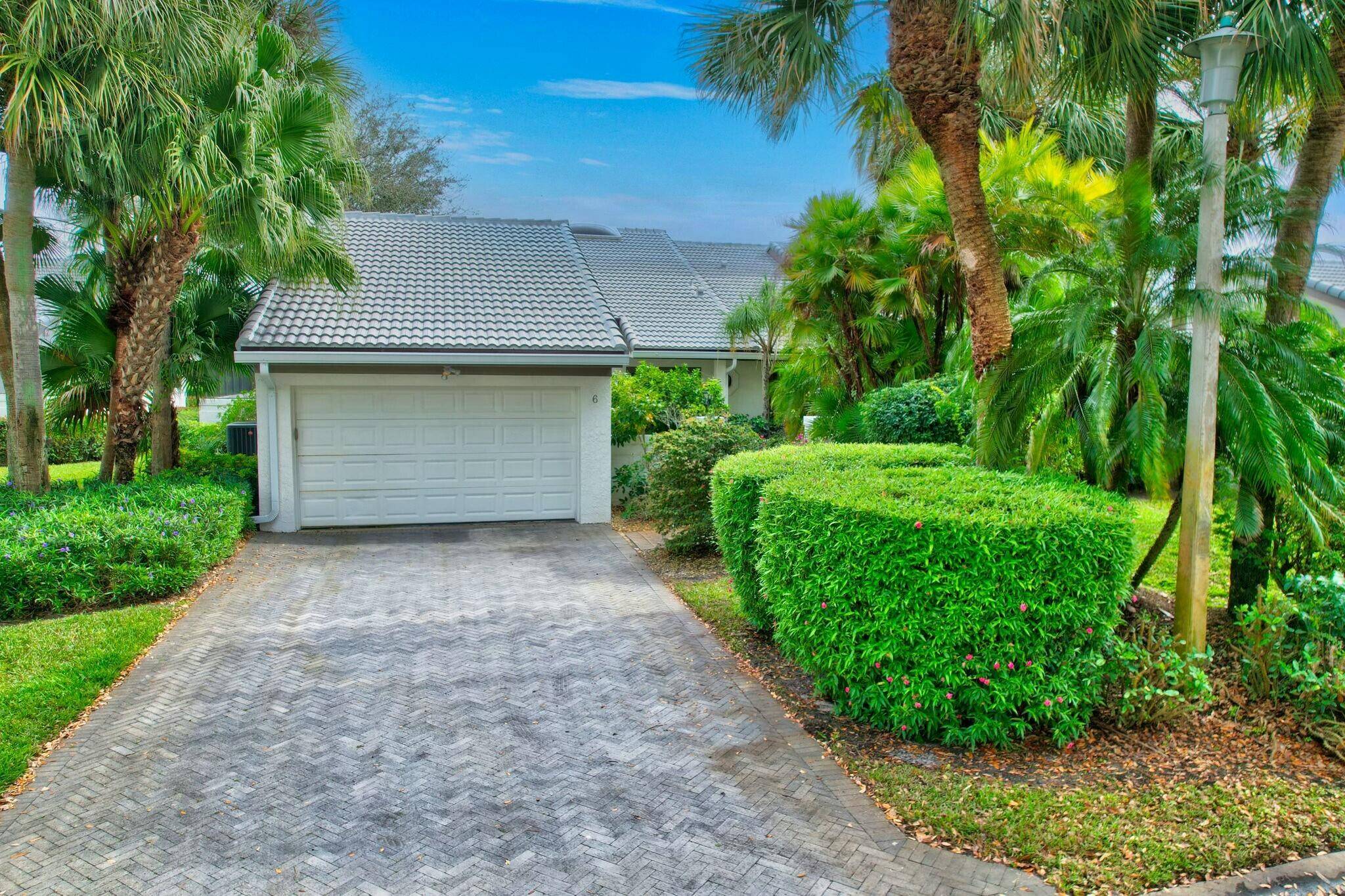 This charming villa in the Essex community offers serene water views, creating a peaceful and picturesque setting.