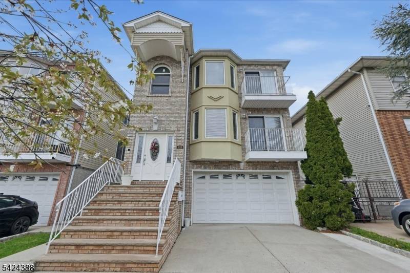 Stunning newer construction in the highly desirable Elmora section an exceptional opportunity to own this expansive income producing two family home.