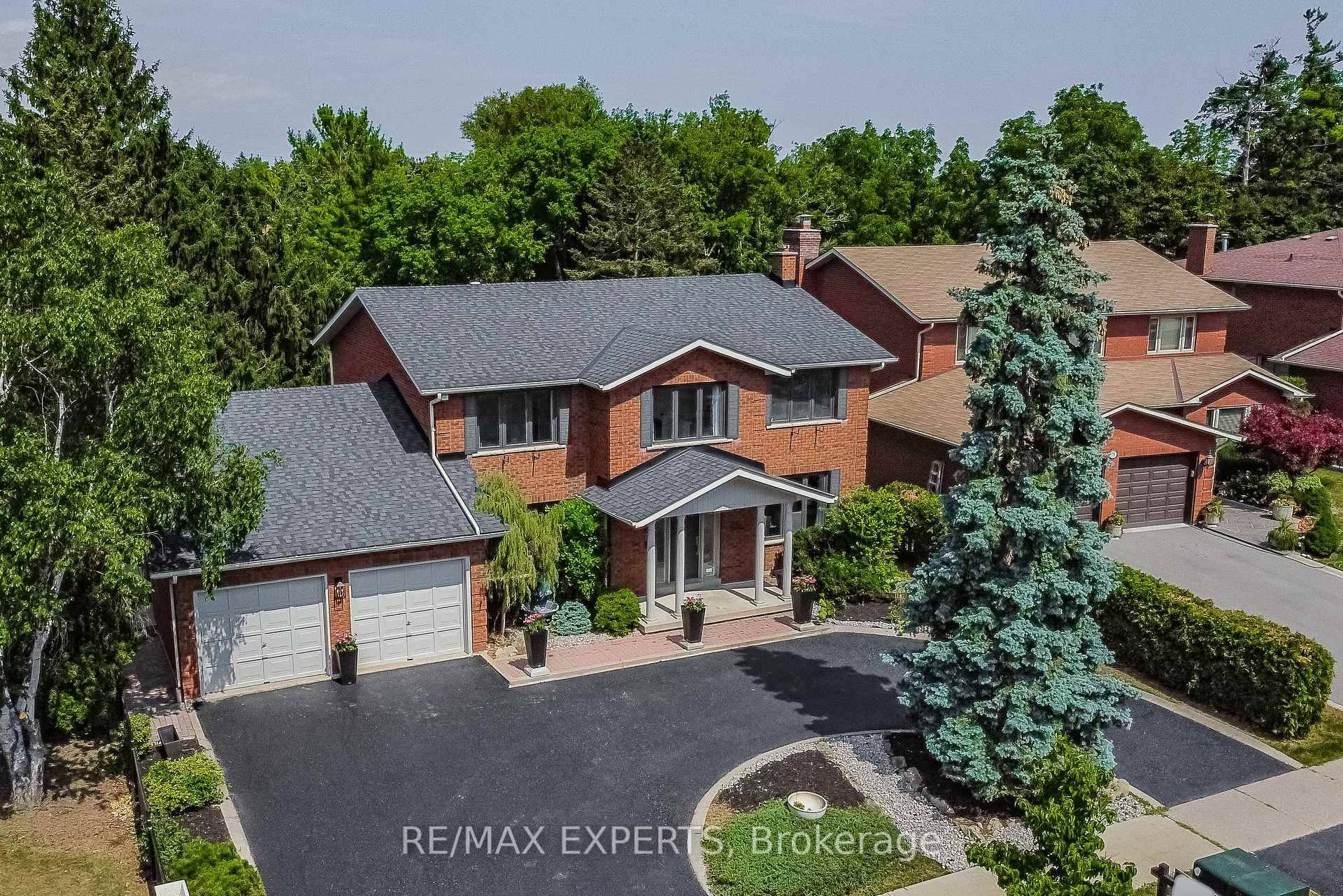 Renovated and fully finished luxury home on large quarter acre lot with mature trees.