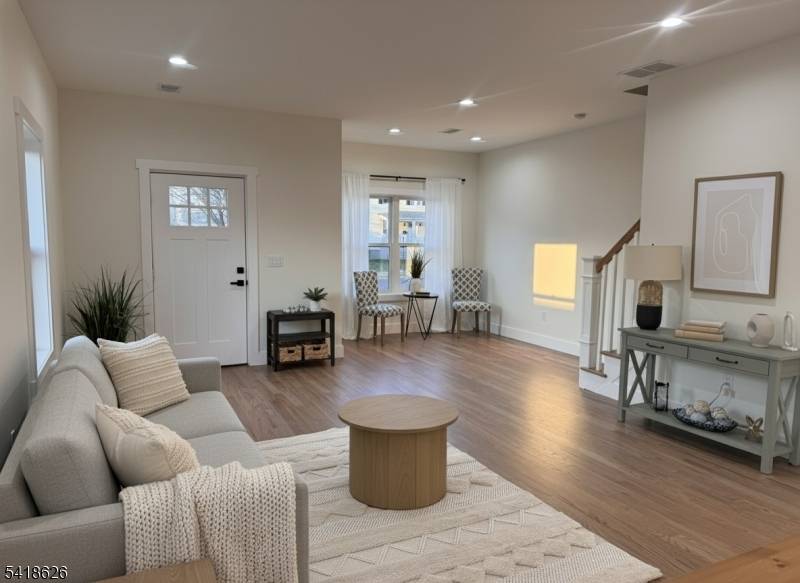 Welcome home to this stunning new construction Colonial, which boasts 9 foot ceilings on the first floor.