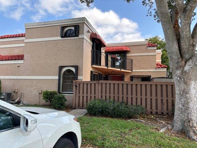 Fully remodeled, 3 bedroom and 3 full bath corner townhouse at the center of Boca Raton.