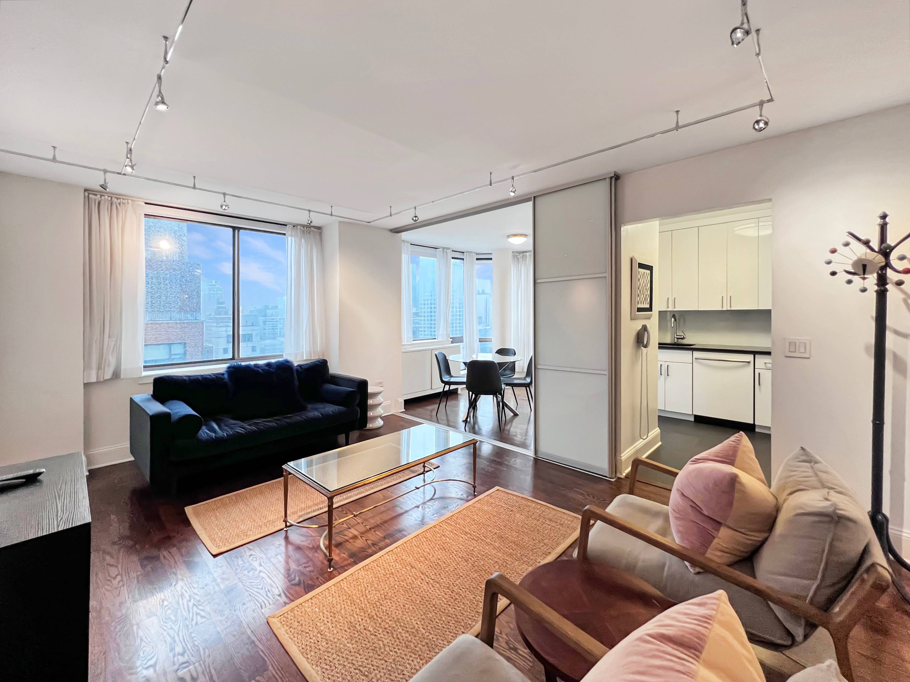 This beautifully appointed residence offers one spacious bedroom, two full bathrooms, and a versatile dining room that easily converts into a second bedroom all within an intimate boutique condominium located ...