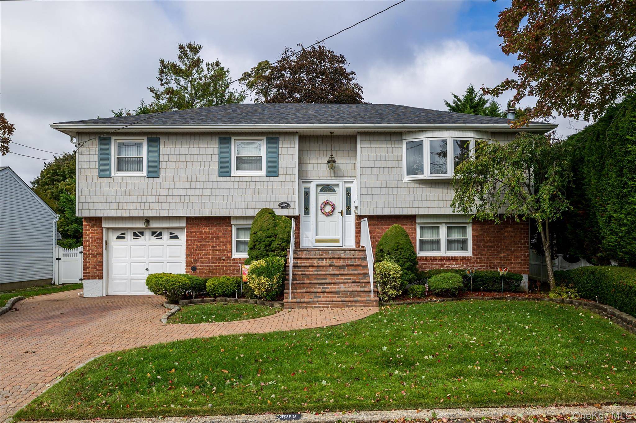 Welcome to this well maintained wide line Hi Ranch located in the desirable Twin Lakes section of Wantagh.