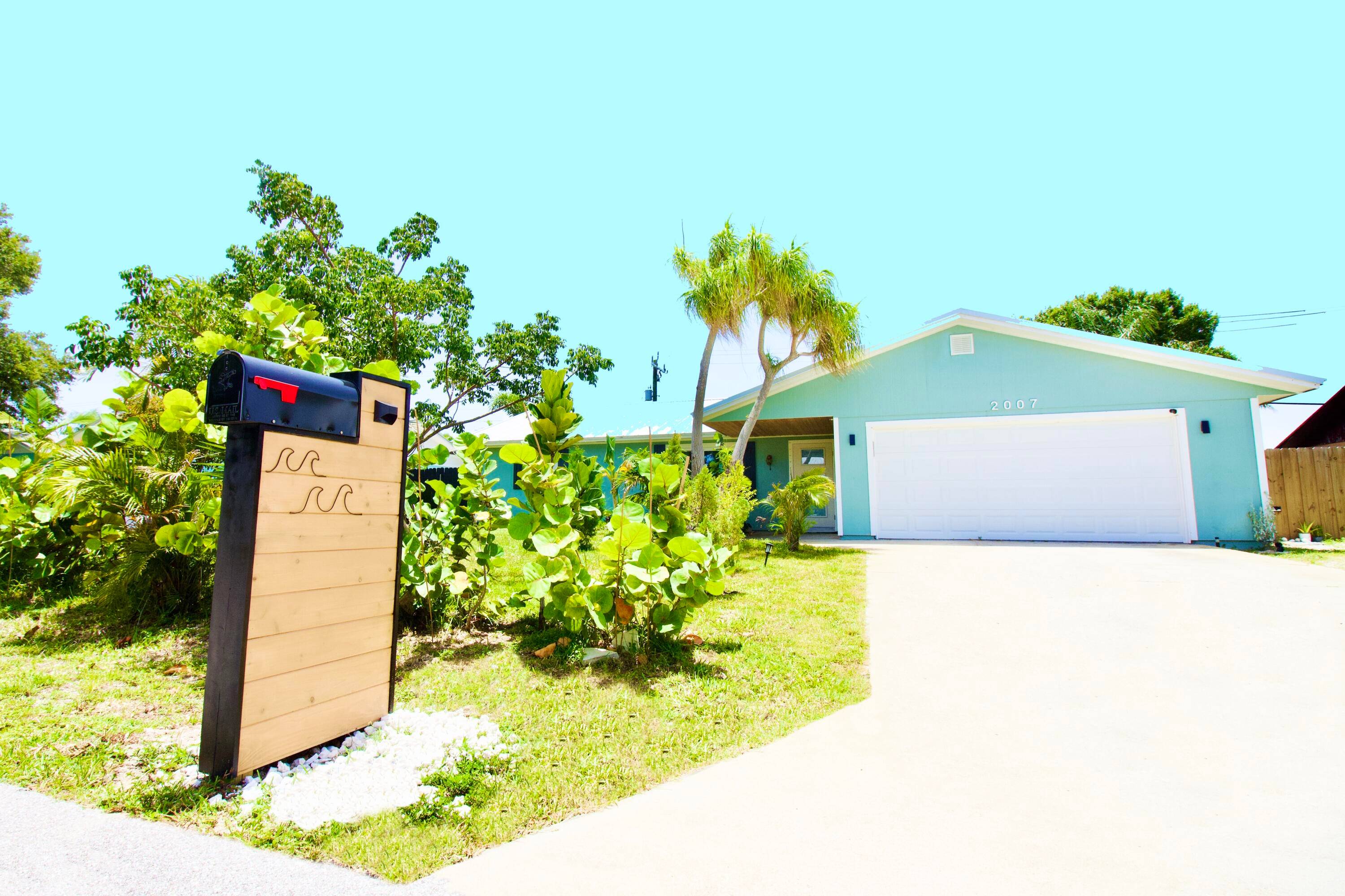 Fully renovated and move in ready, this Jensen Beach gem sits high and dry on a quiet street.
